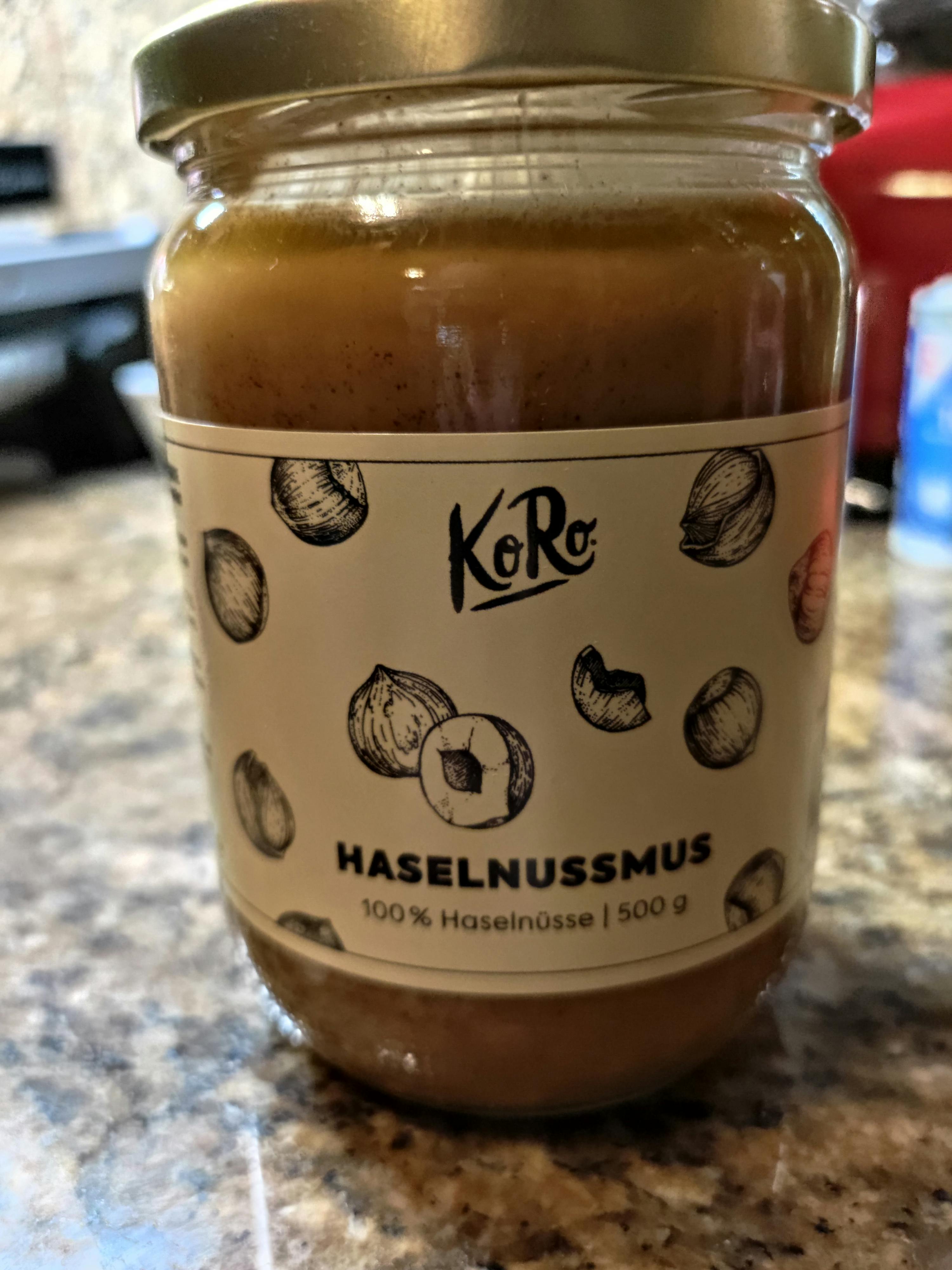 a jar of hazelnussmus is sitting on a counter