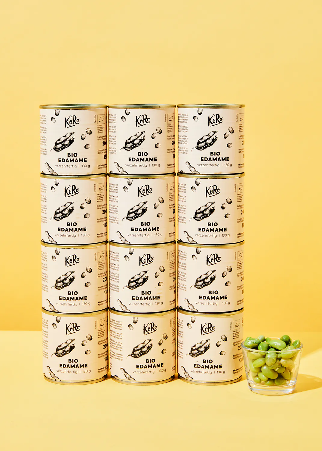 12 cans of bio edamame are stacked on top of each other