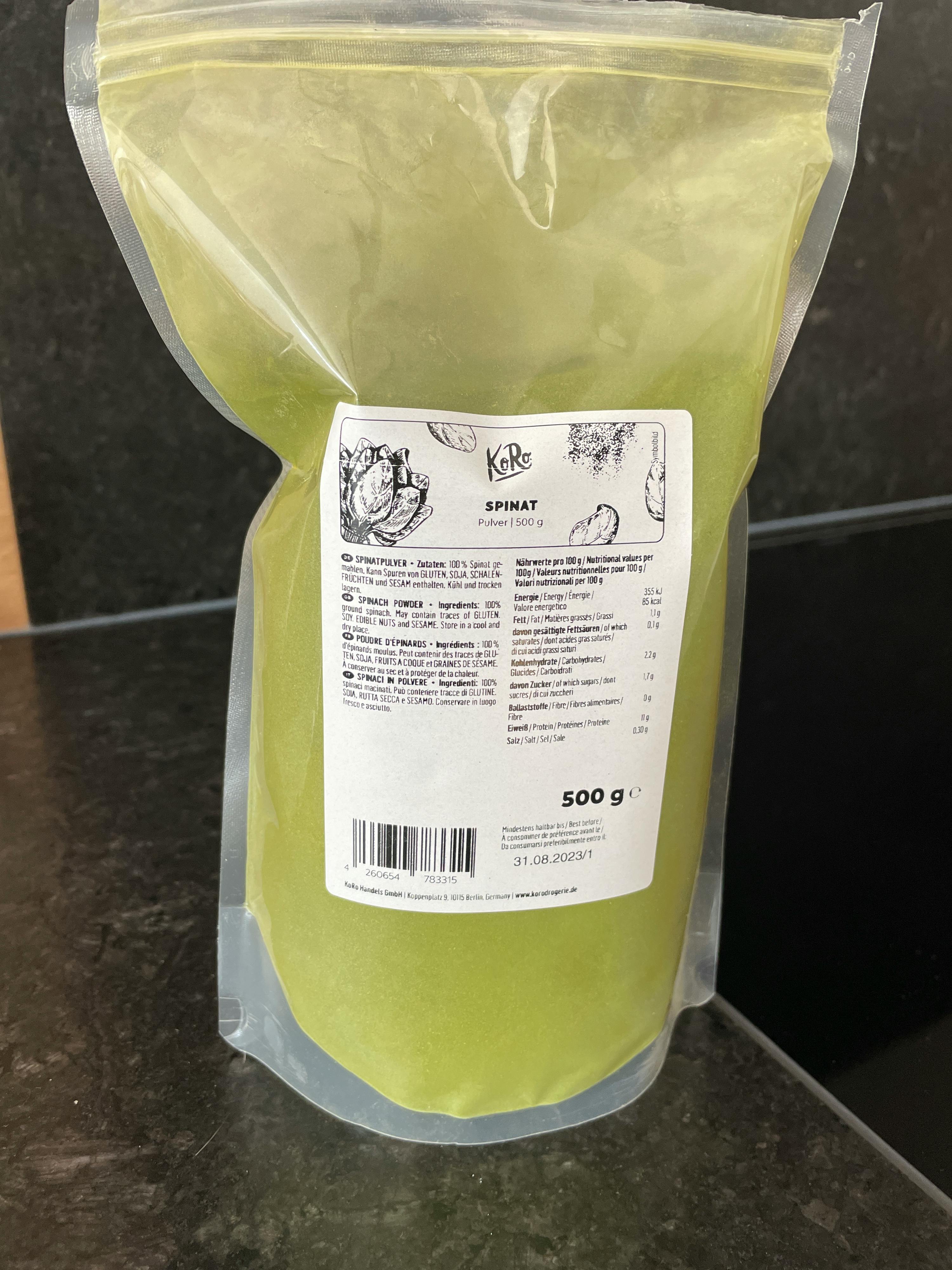 a bag of spinach powder is sitting on a table