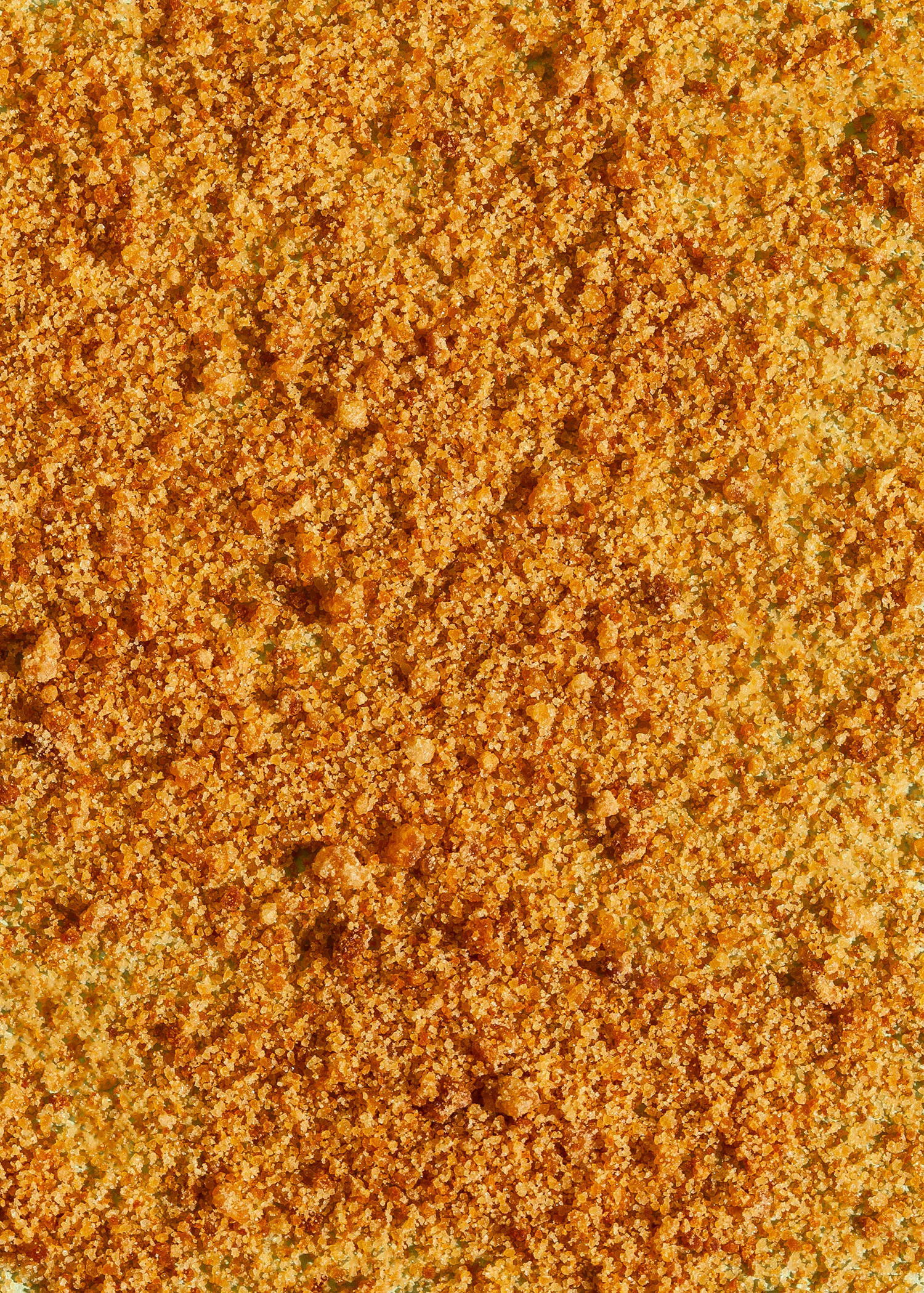 a close up of a brown colored substance with a grainy texture