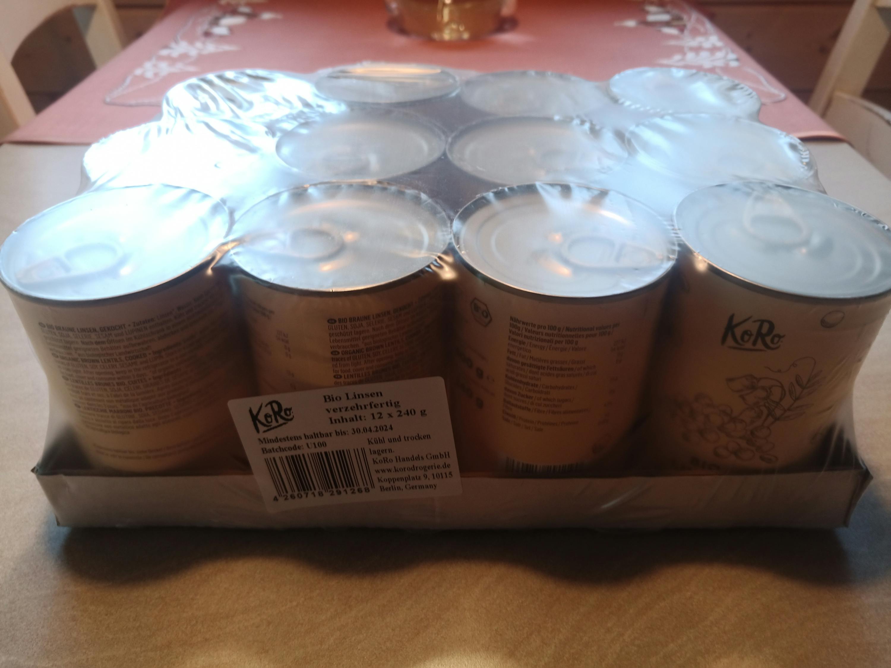 un vassoio di lattine con sopra un codice di tracciamento