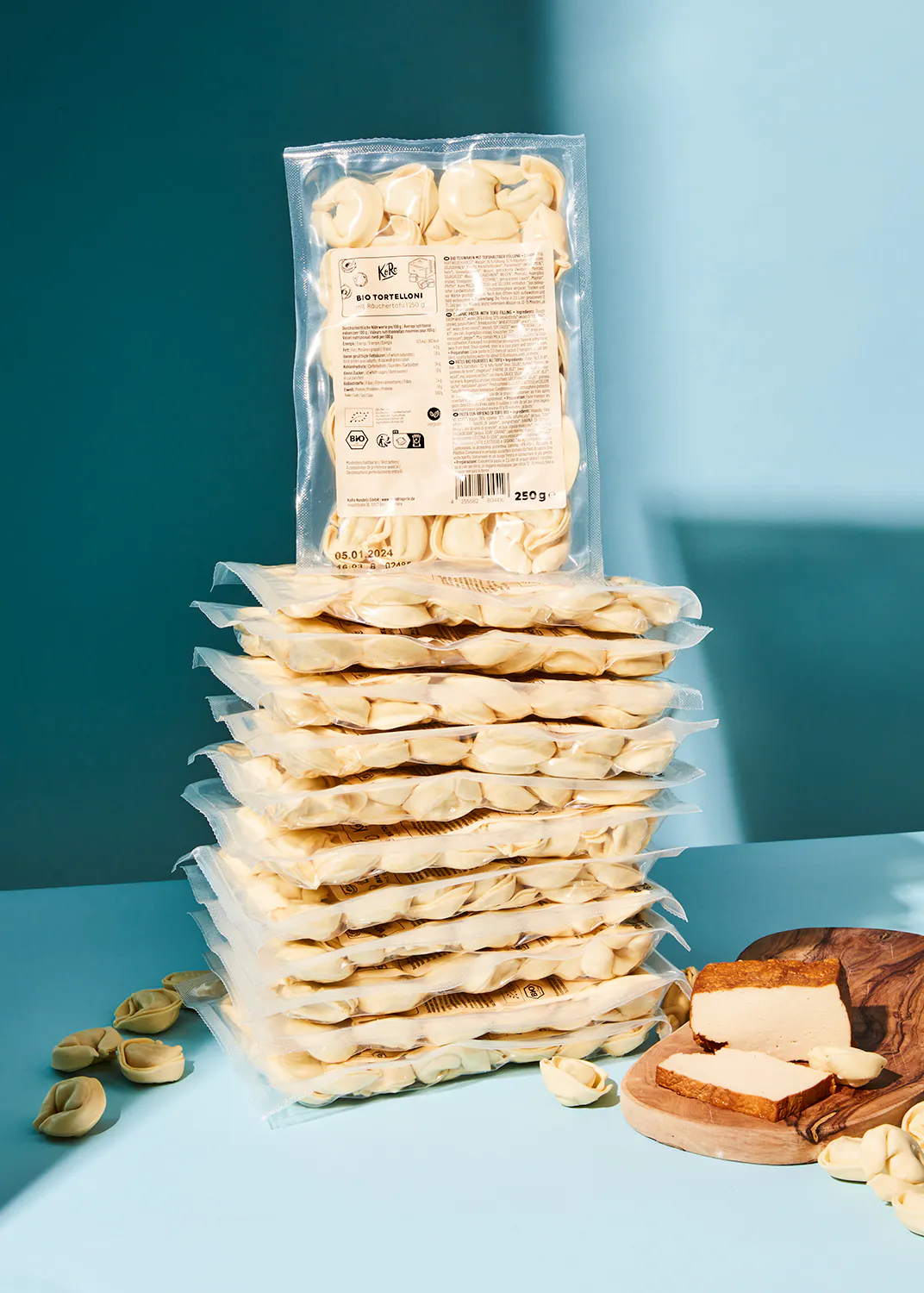 a bag of ravioli is stacked on top of another bag of ravioli