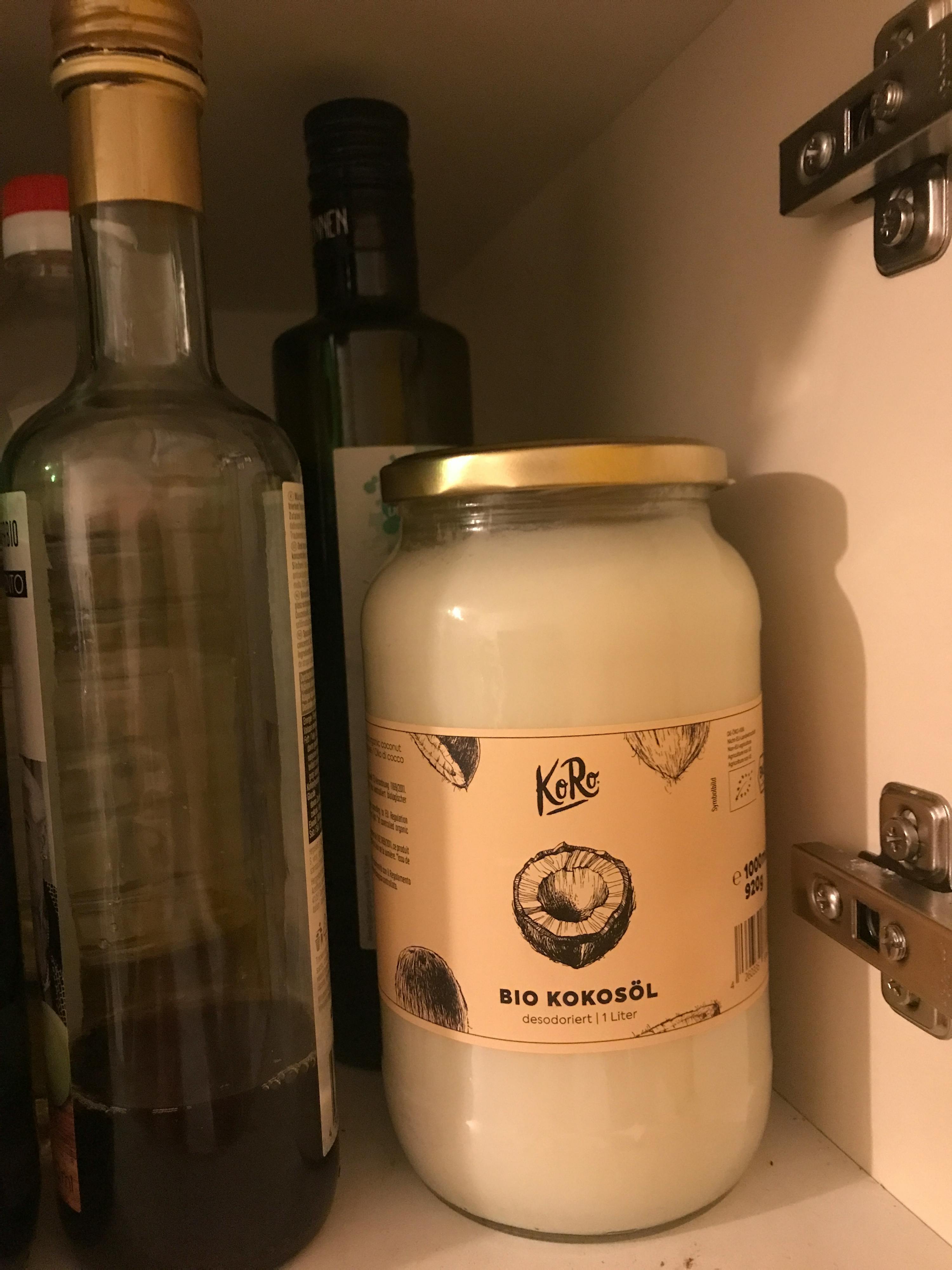 a jar of bio kokosöl sits next to a bottle