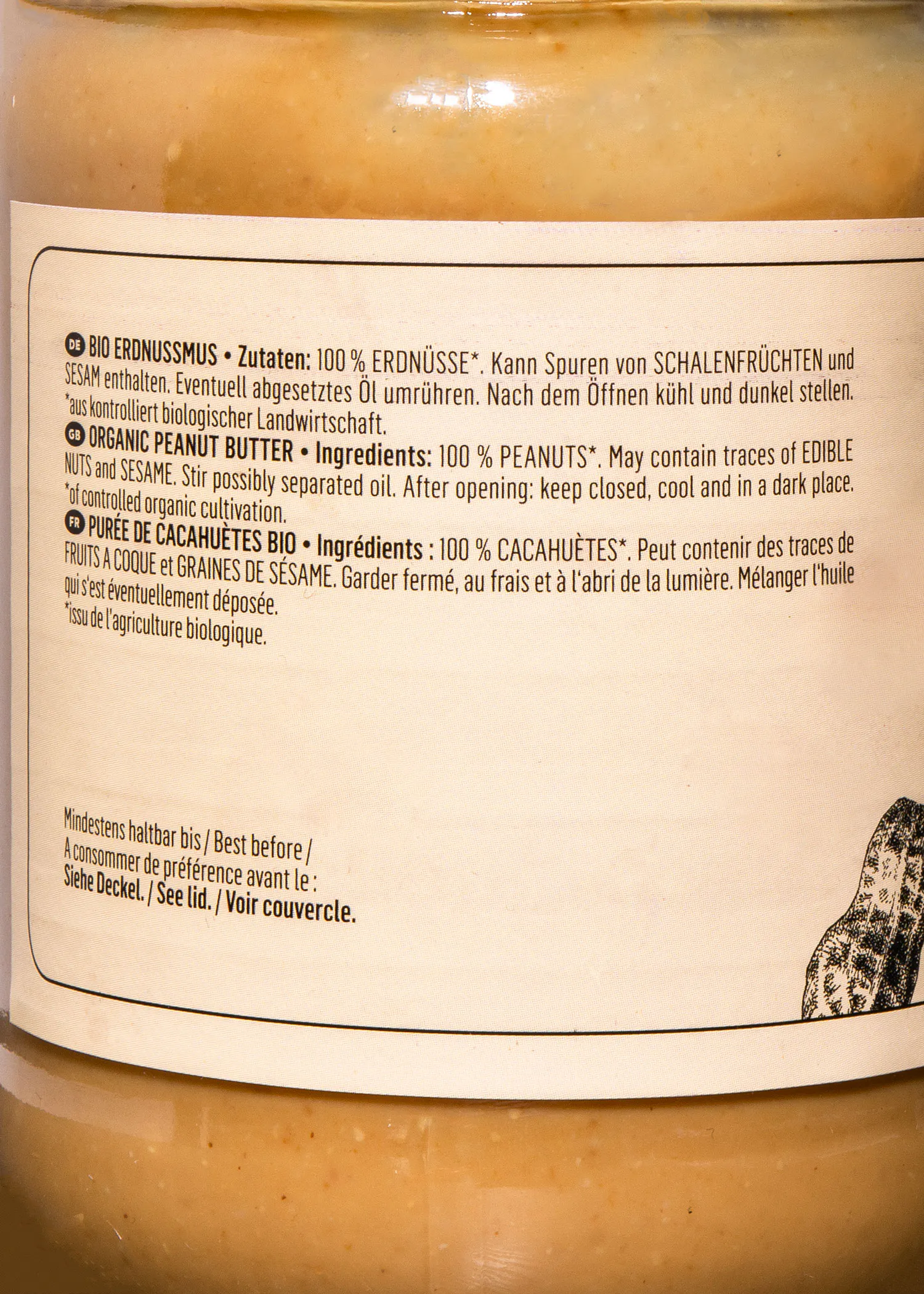 eine Nahaufnahme der Rückseite eines Glases Erdnussmus