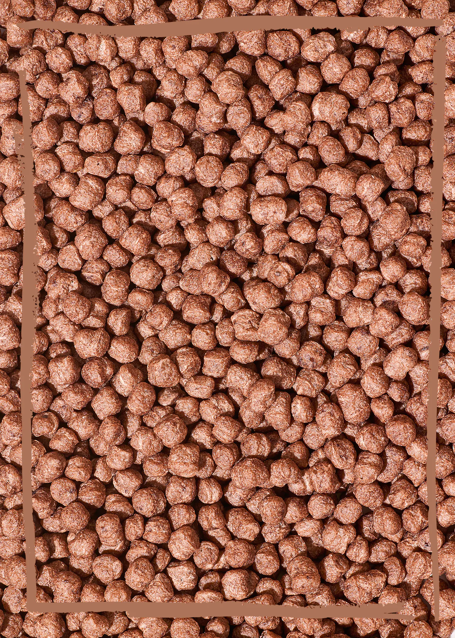 un mucchio di cereali al cioccolato con un bordo marrone