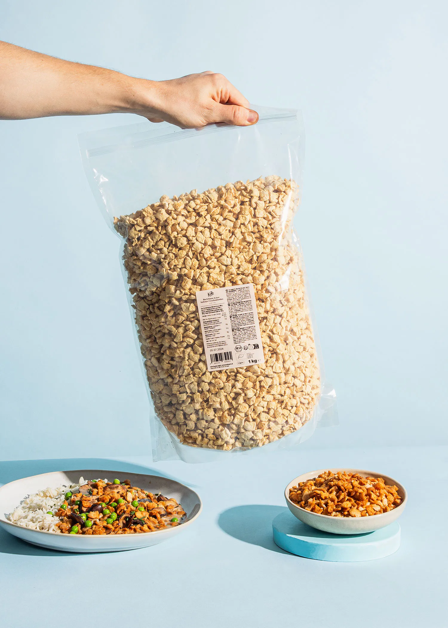 a person is holding a bag of oatmeal next to a bowl of oatmeal