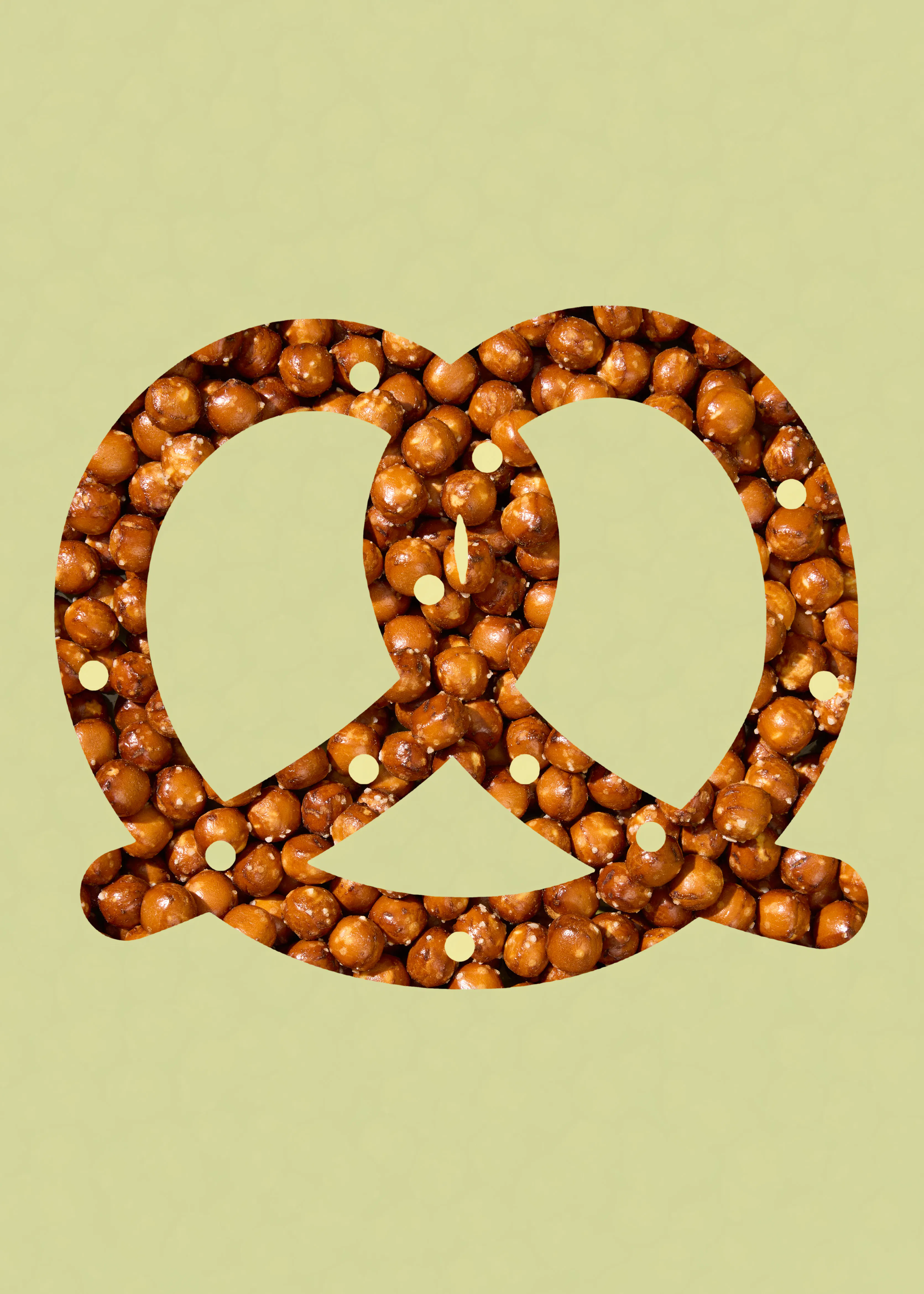 a pretzel is cut out of nuts on a yellow background