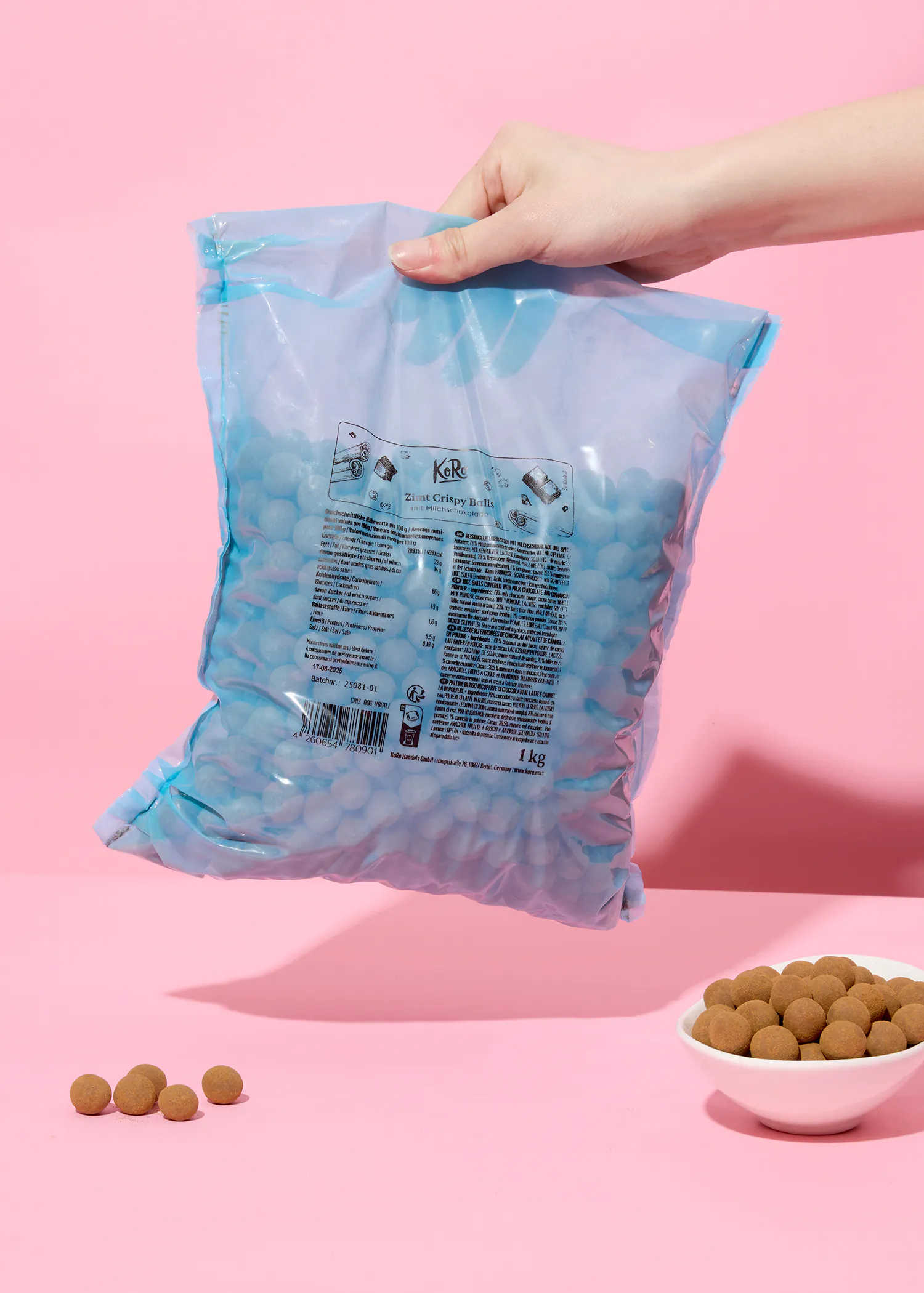 a person is holding a bag of k & r candy