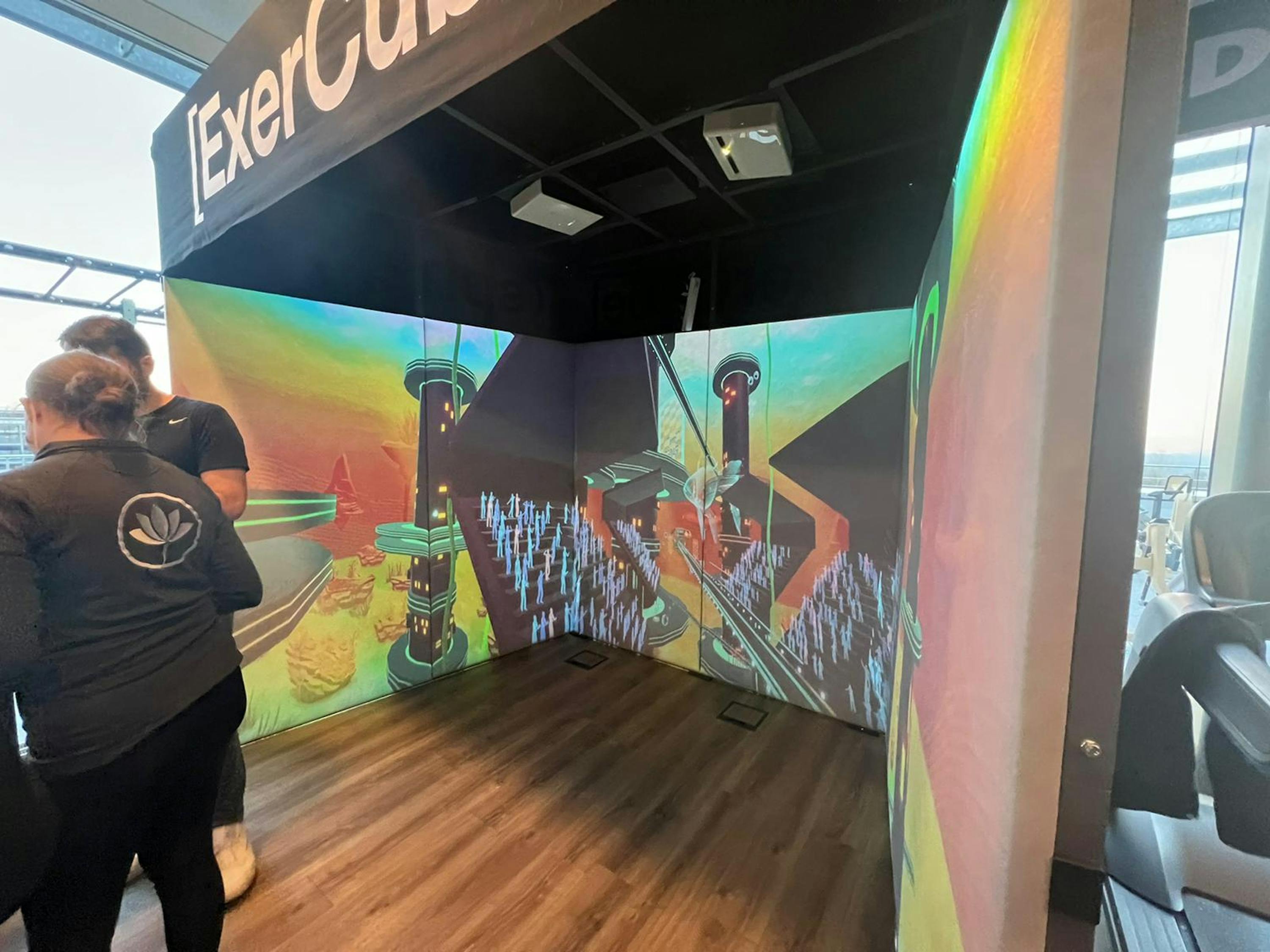 people standing in a room with a sign that says " exercise "