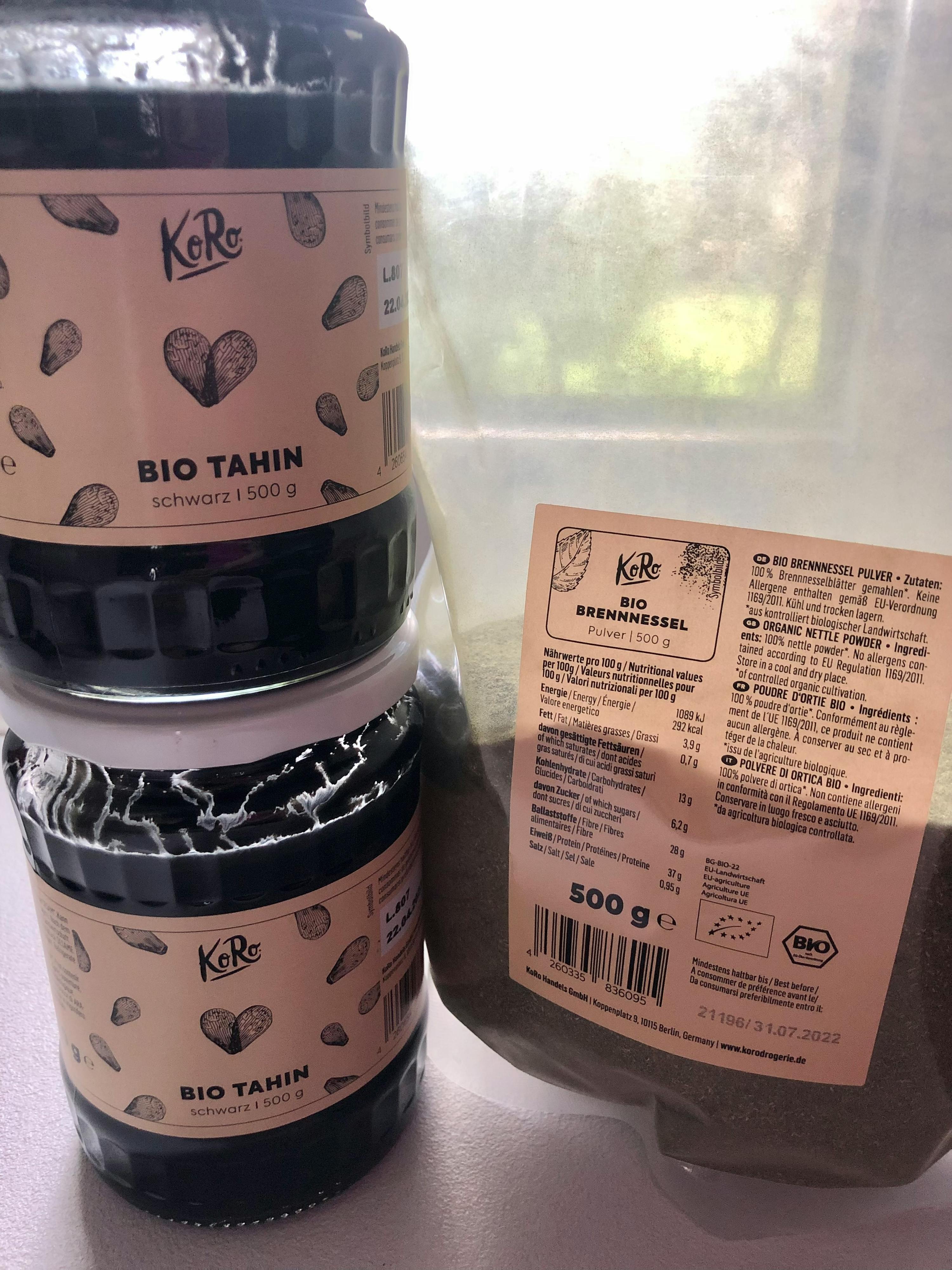 a jar of bio tahin sits next to a bag of bio tahin