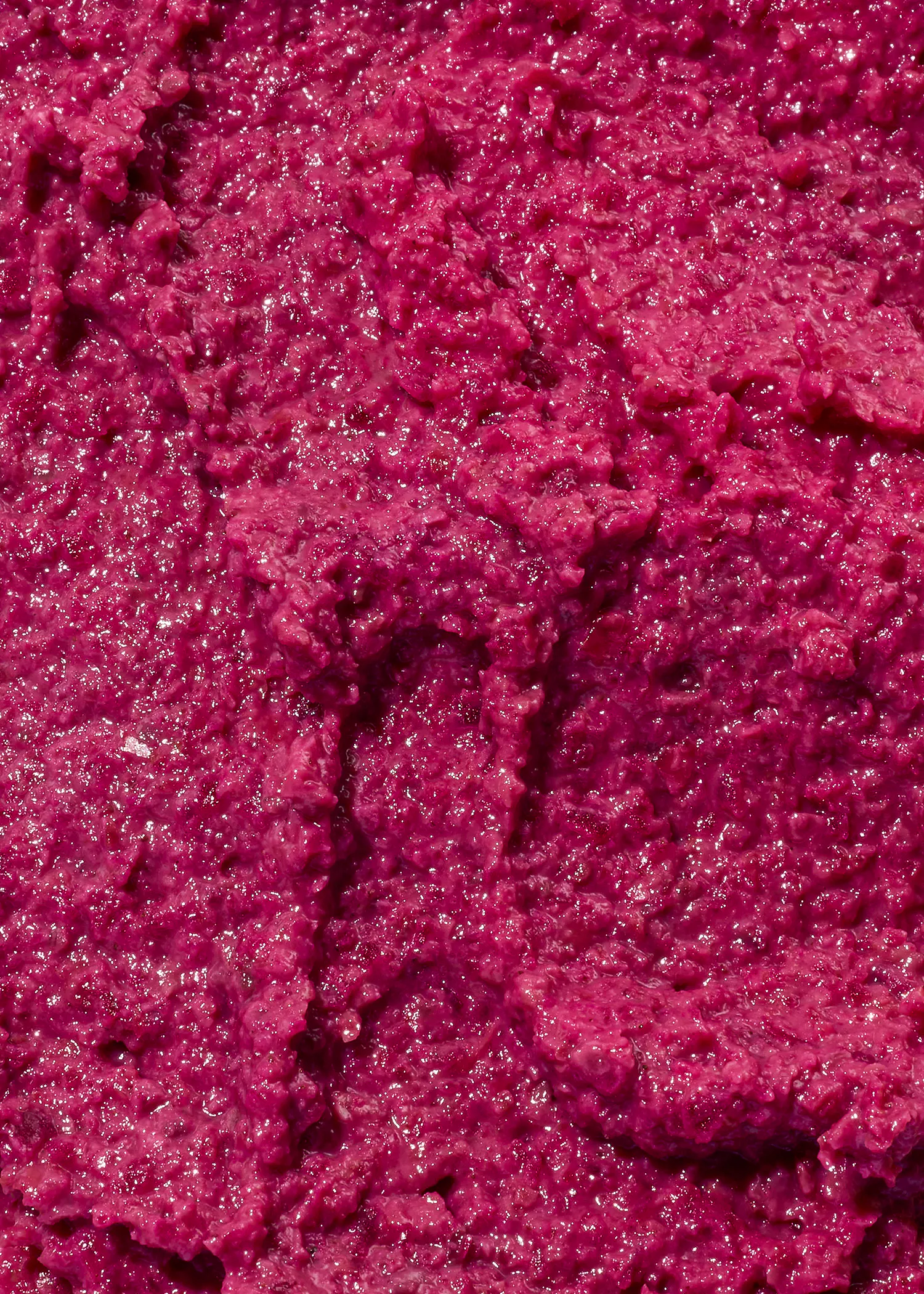 un gros plan d' un morceau de gelée rose