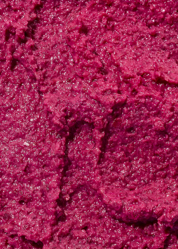 un gros plan d' un morceau de gelée rose