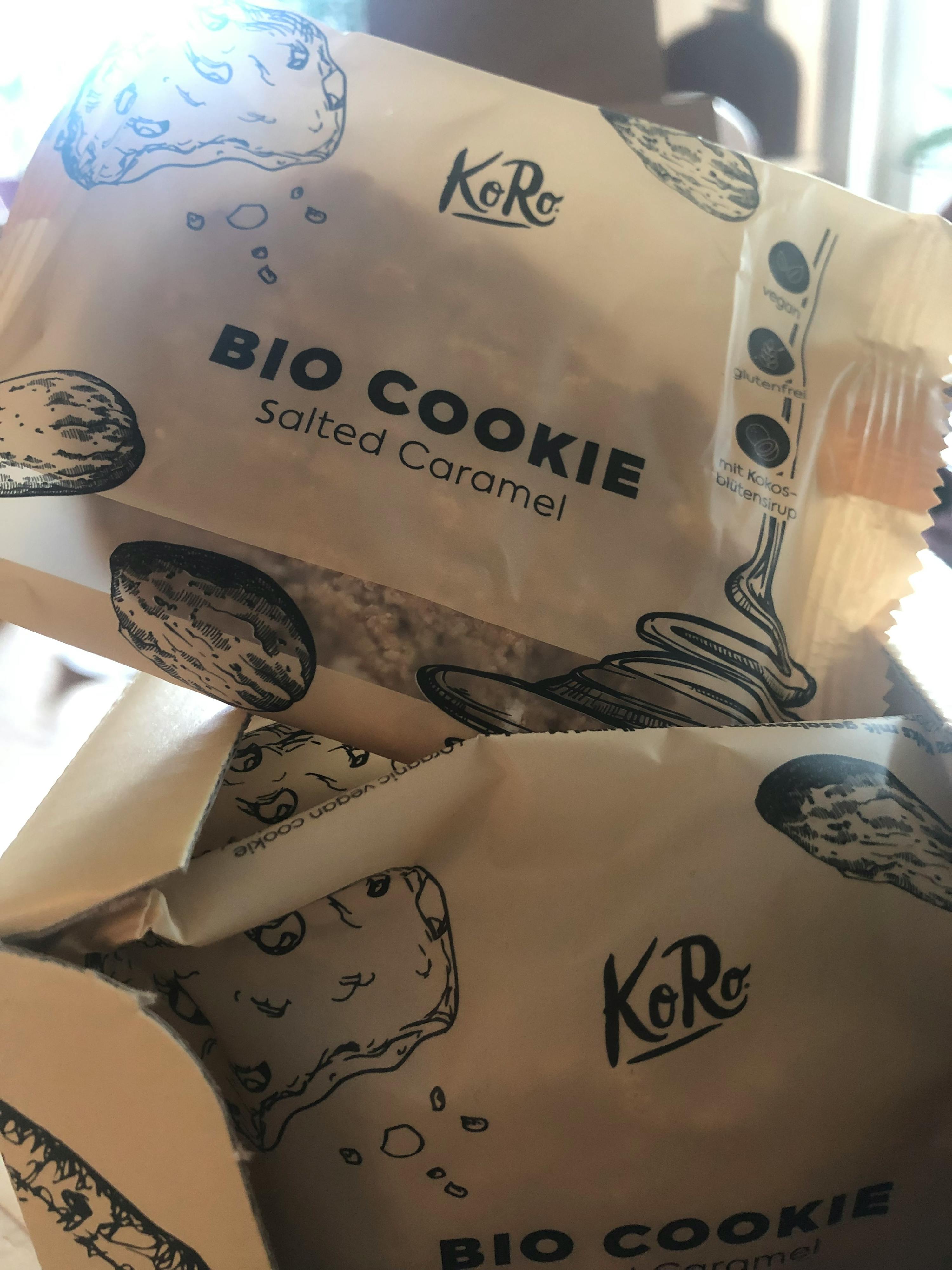 two bags of bio cookie salted caramel are stacked on top of each other