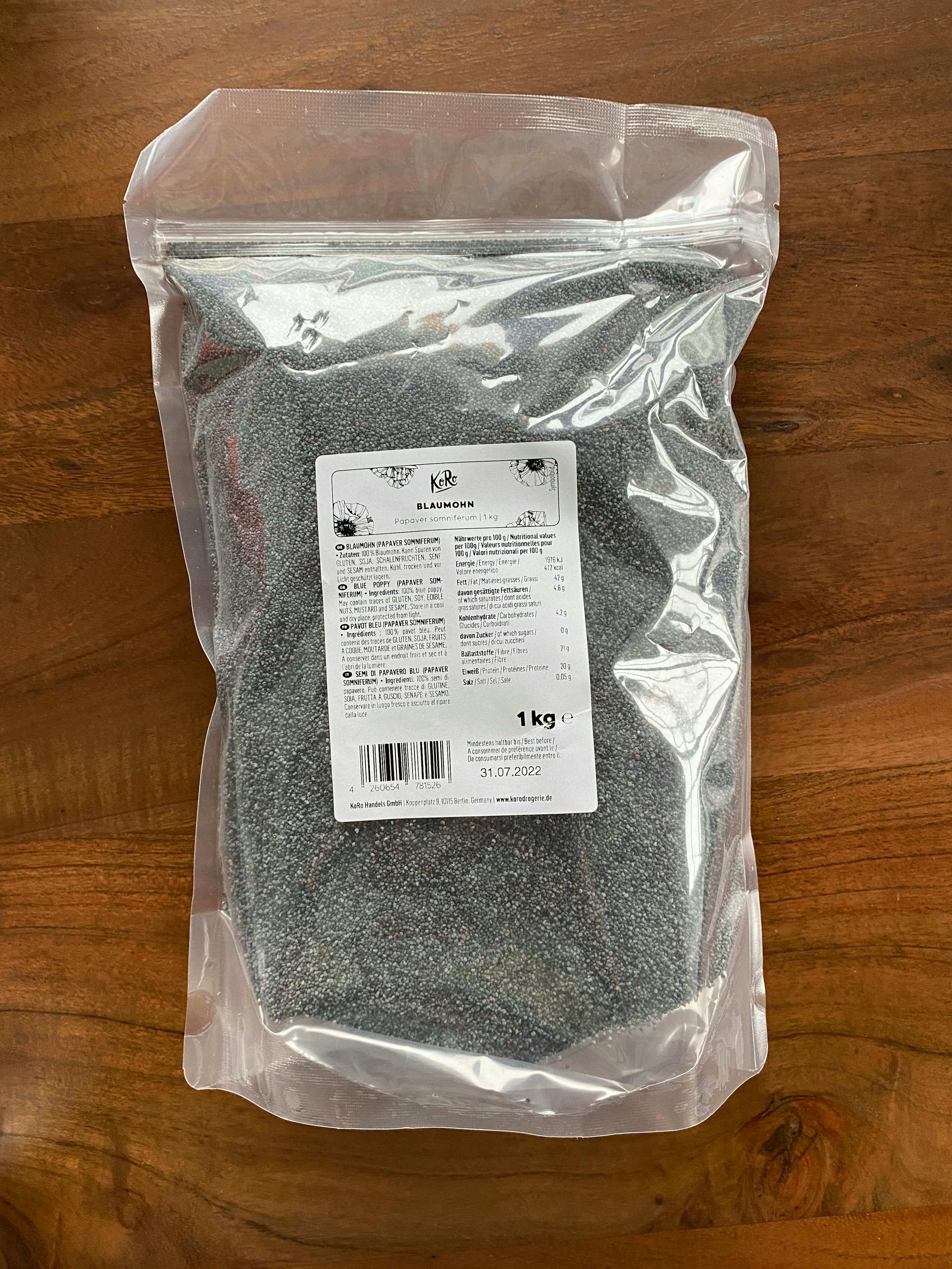 a bag of poppy seeds is sitting on a wooden table