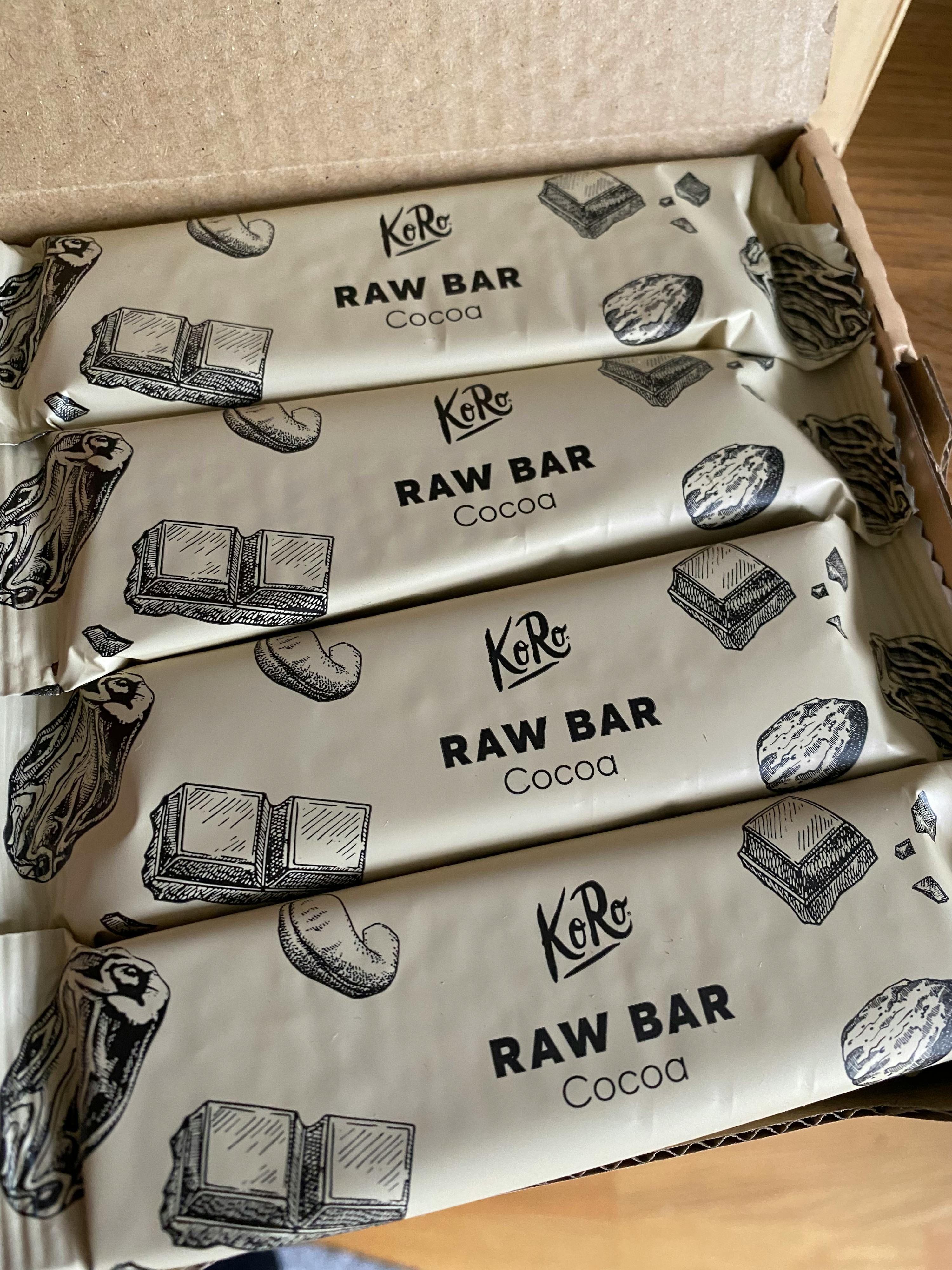a box of kare raw bar cocoa chocolate bars