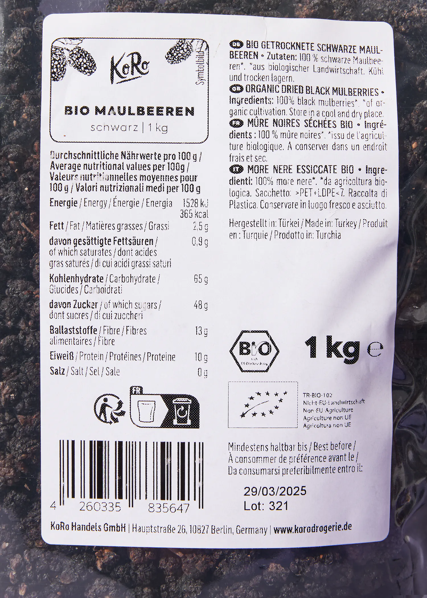 the back of a package of organic dried black mulberries by kara