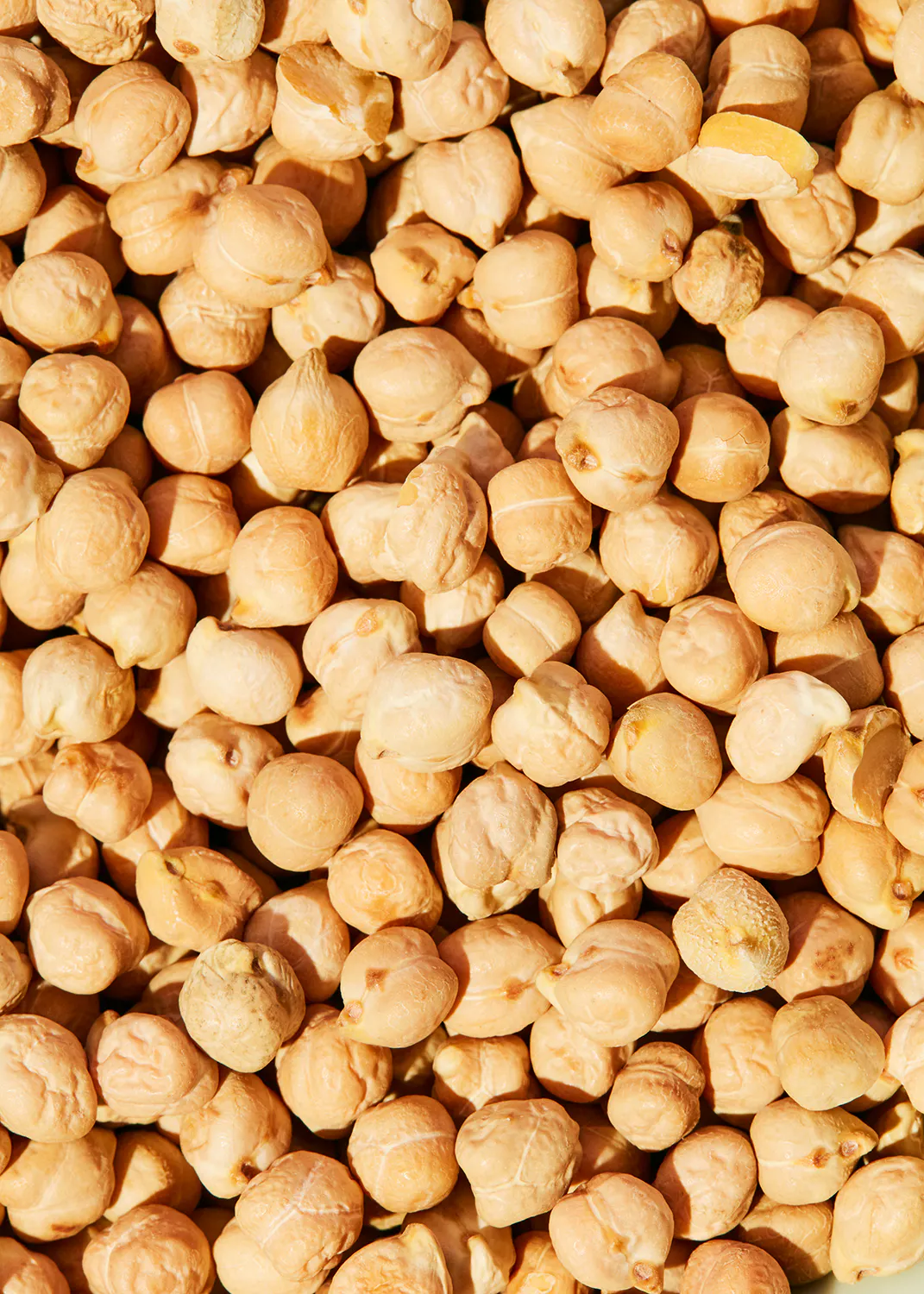 un gros plan d' un tas de pois chiche