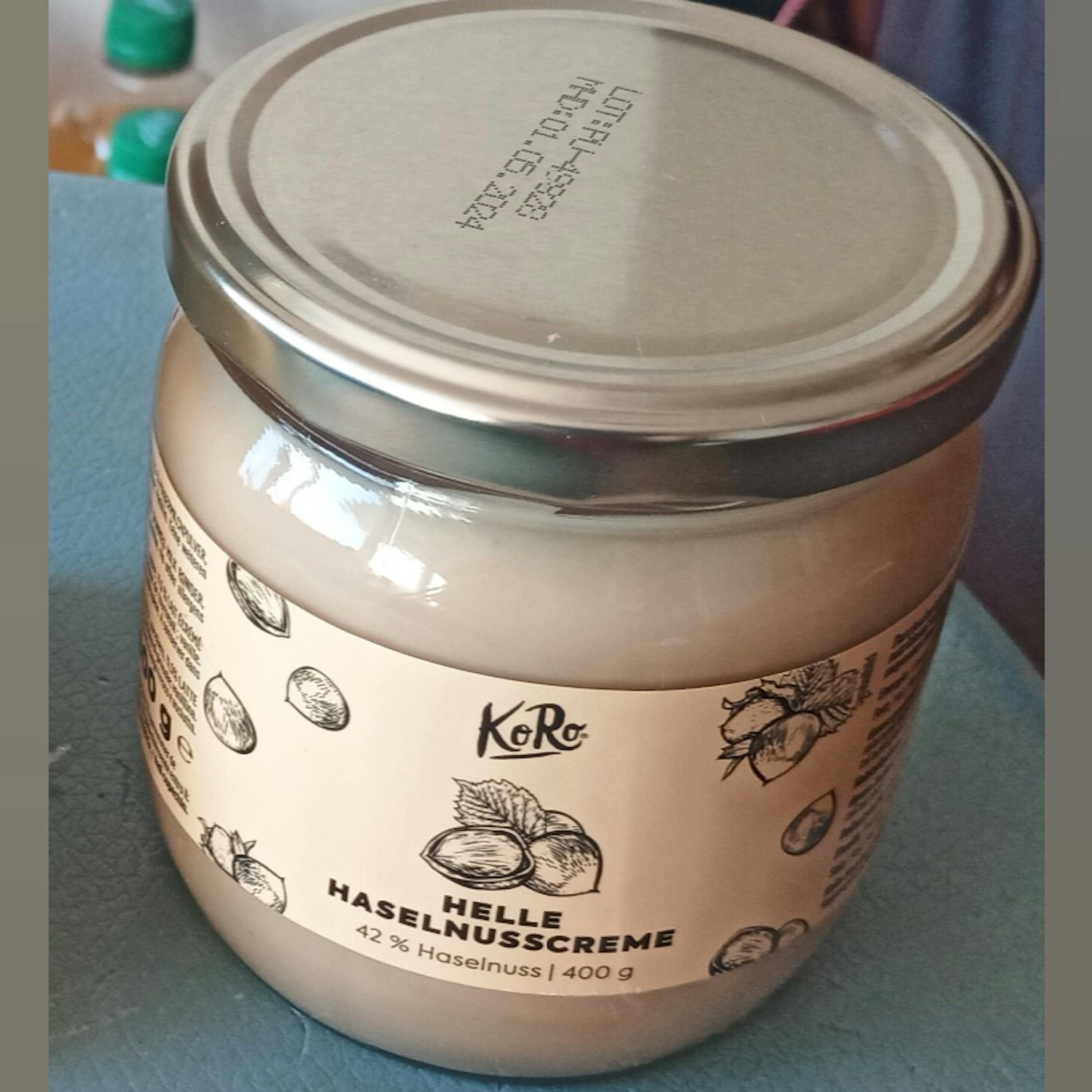 a jar of helle haselnusscreme sitting on a table