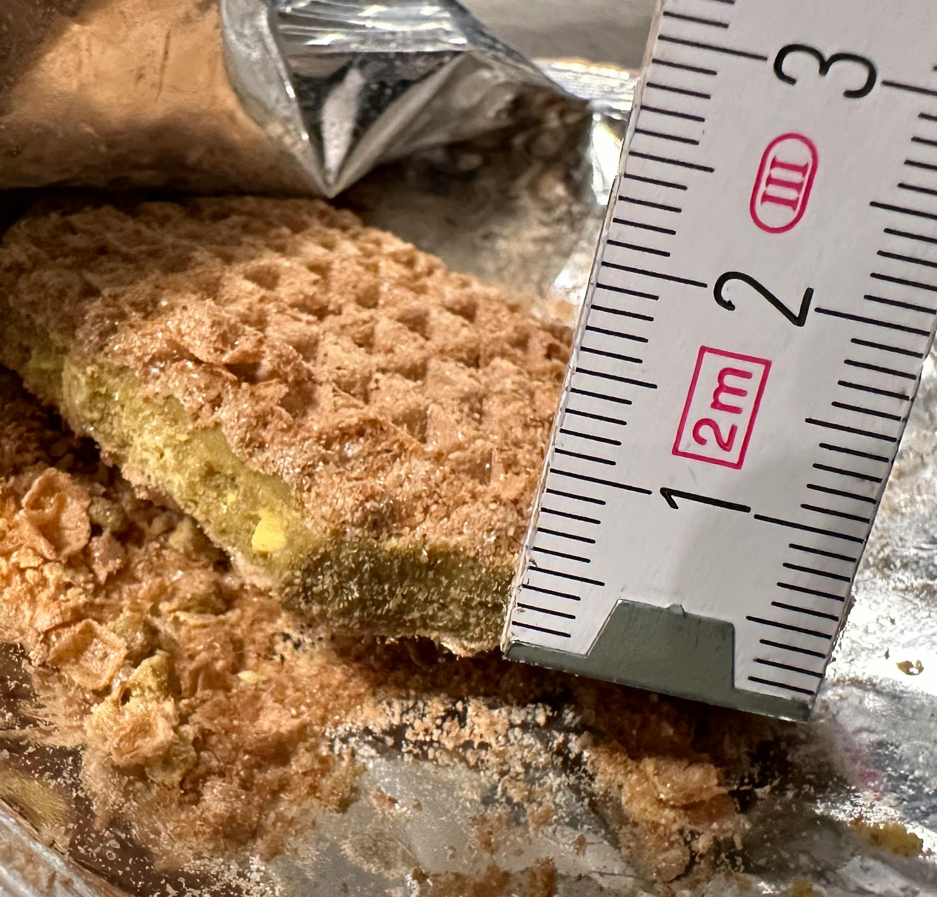 a ruler that says 1 2 and 3 on it