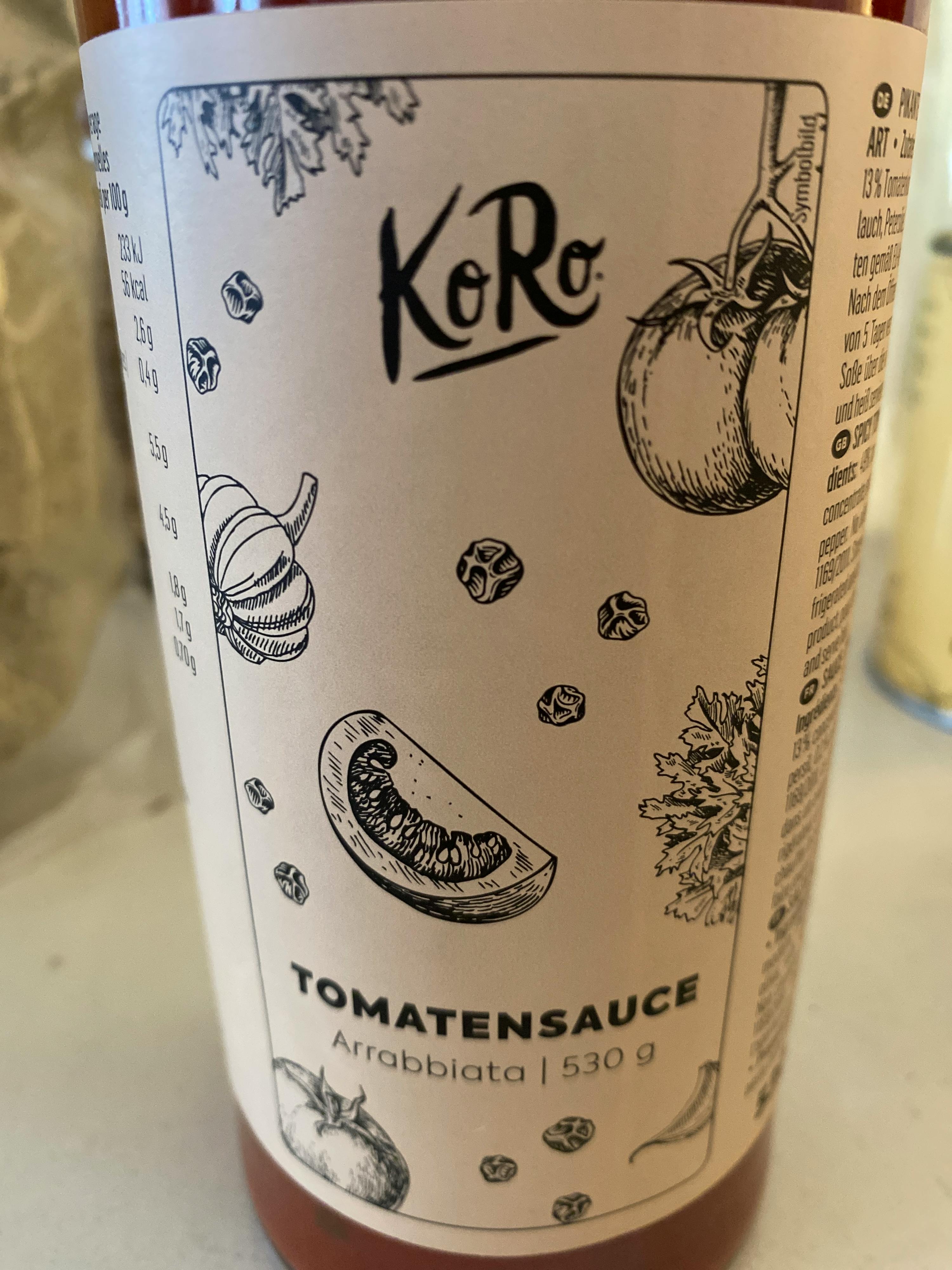 a bottle of tomato sauce has a label that says ' koro ' on it