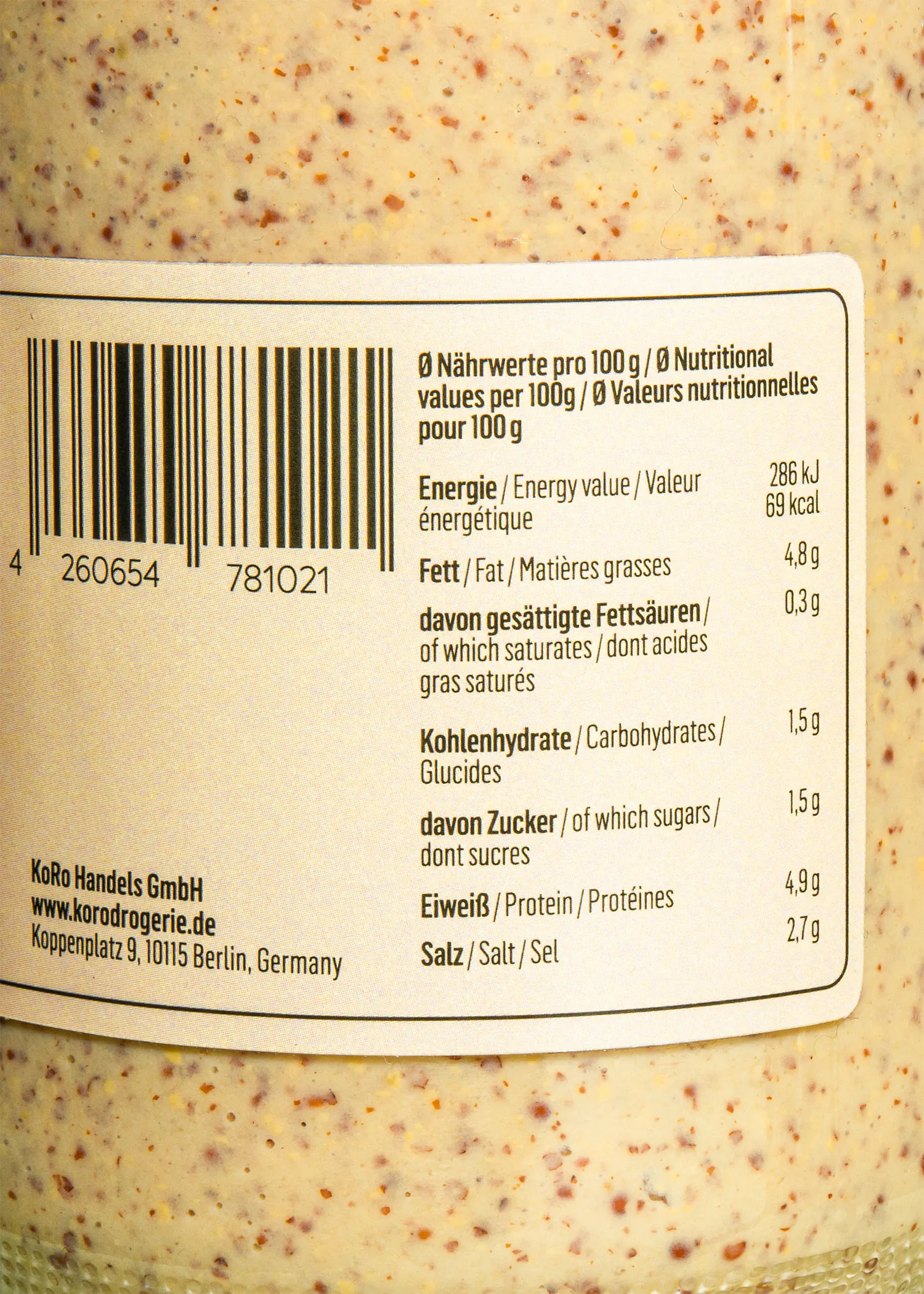 l' étiquette d' un pot de moutarde montre les valeurs nutritionnelles pour 100 g