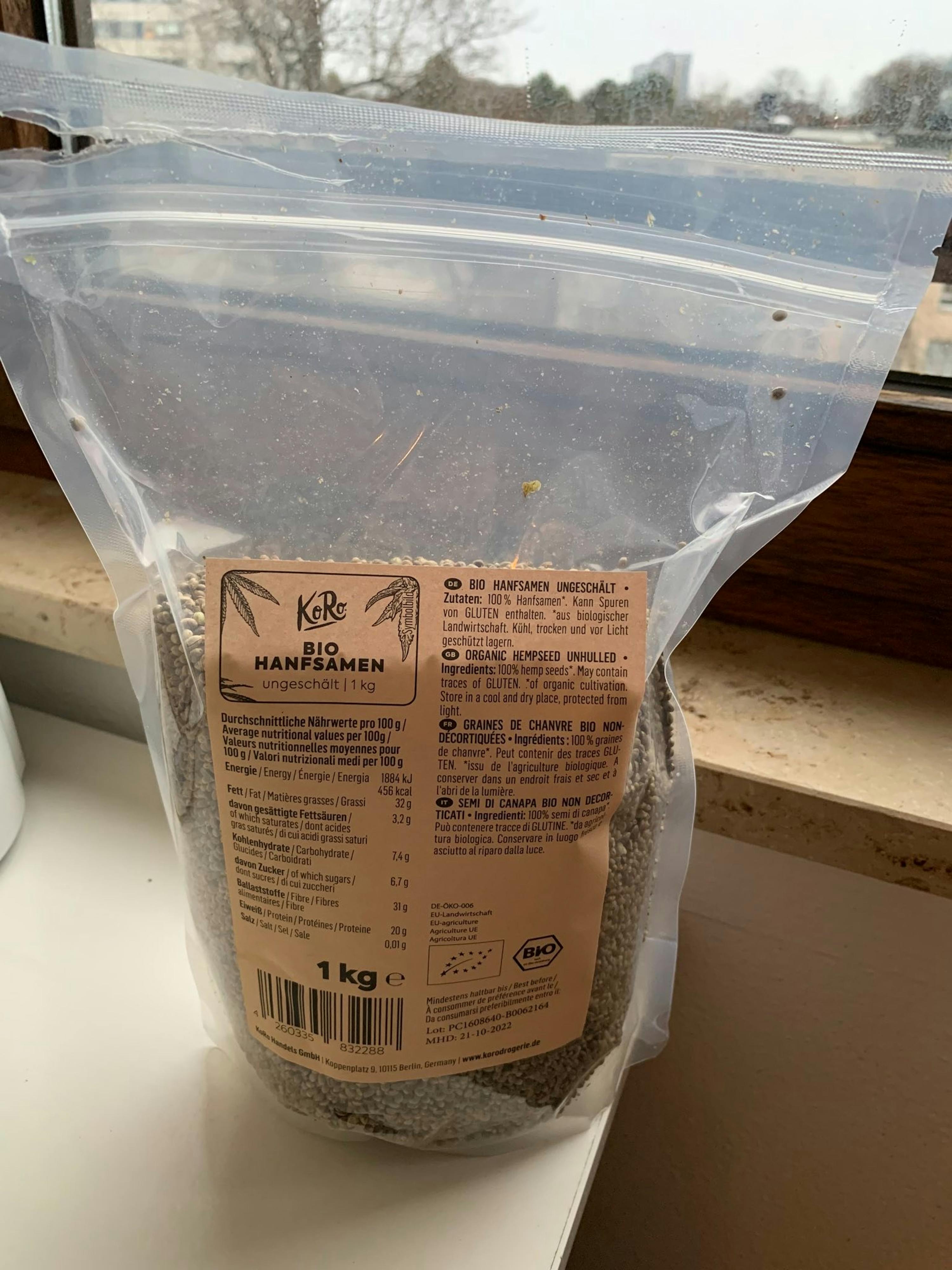 a bag of bio hemp seeds sits on a window sill