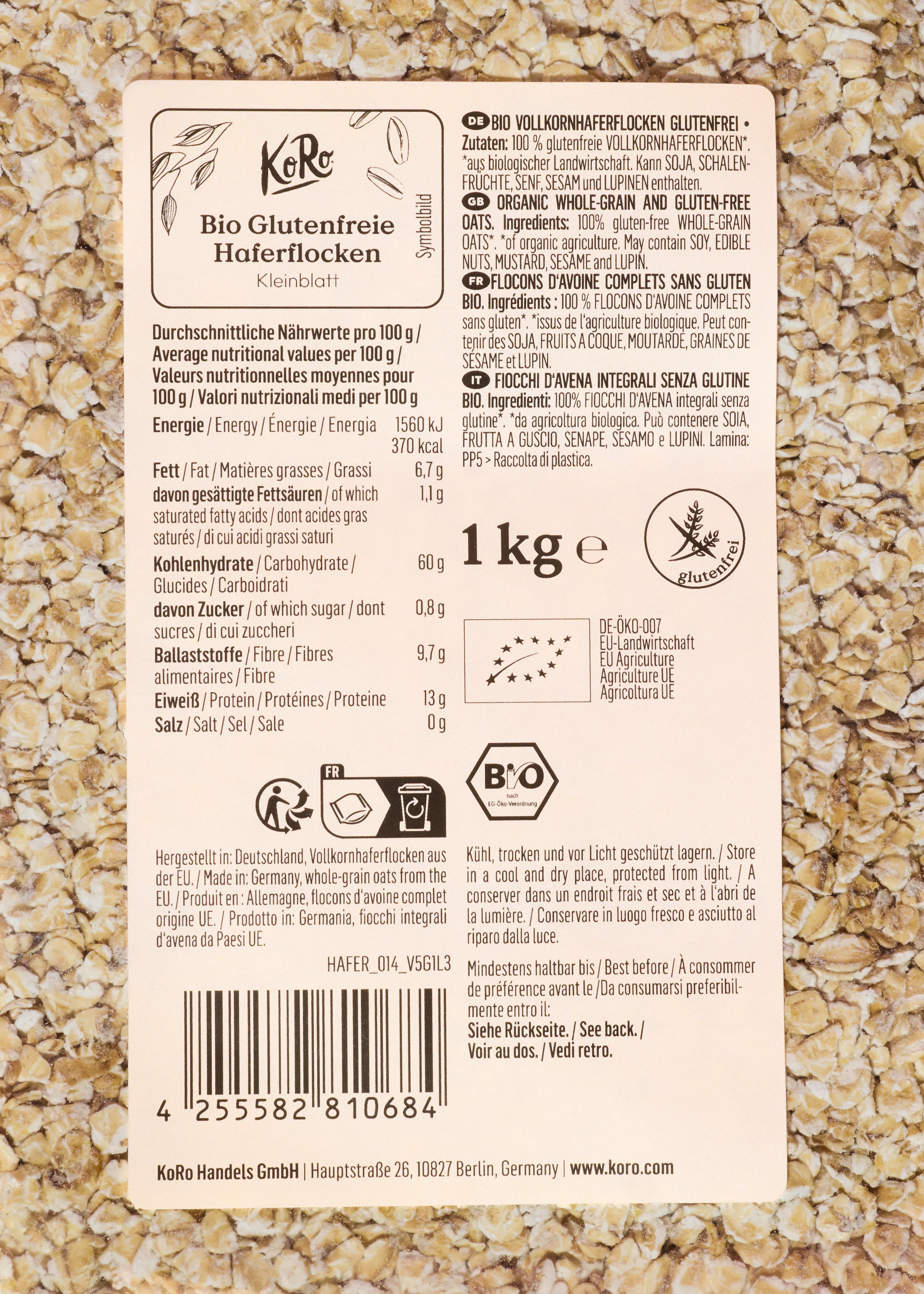 eine verpackung von koro bio glutenfreien kleinblatt haferflocken mit nährwertangaben, zutaten in mehreren sprachen und dem gewicht von 1 kg.