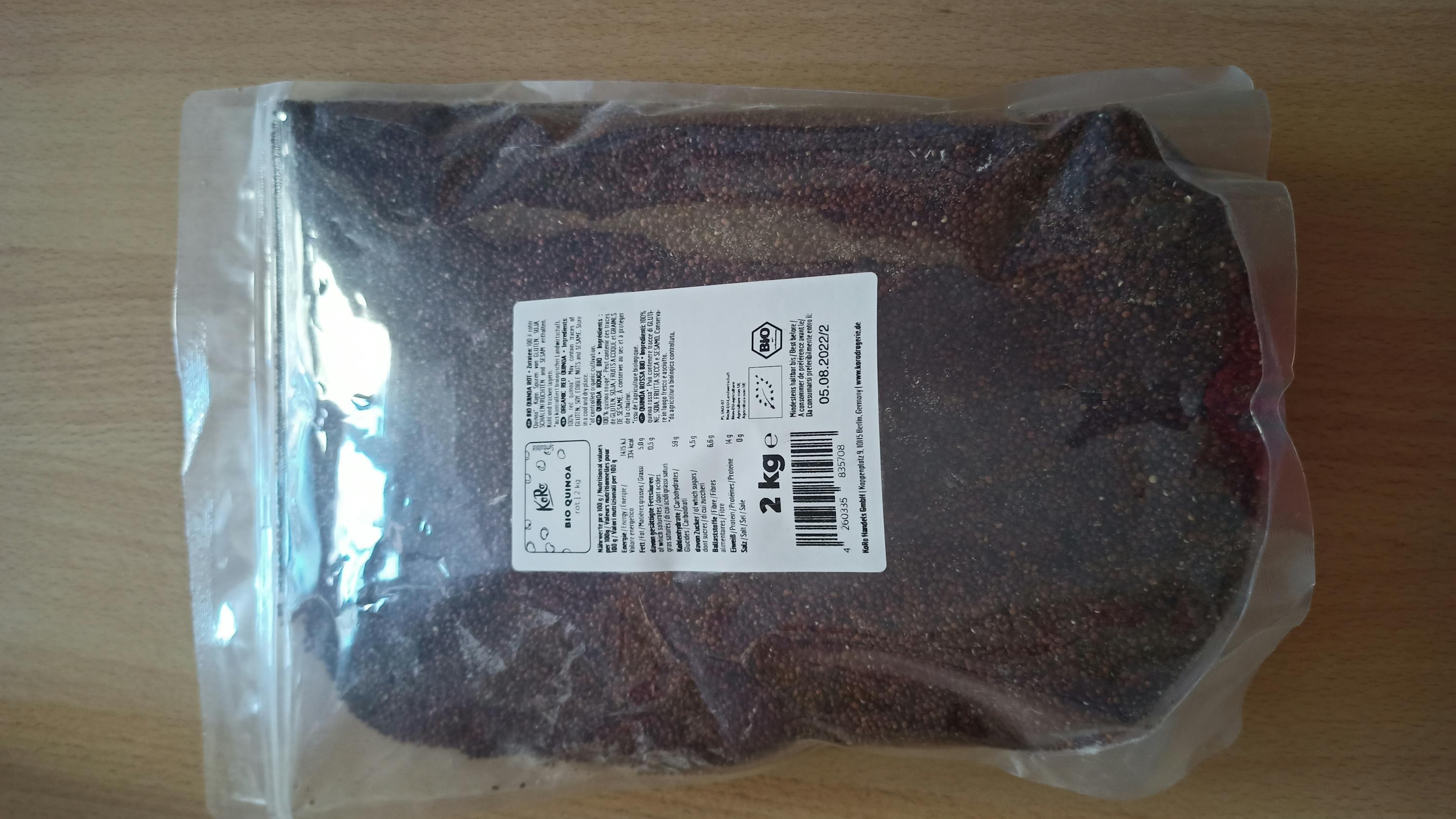 a bag of food with a label that says 2 kg on it