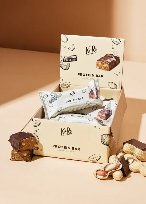 a box of koro protein bars sitting on a table