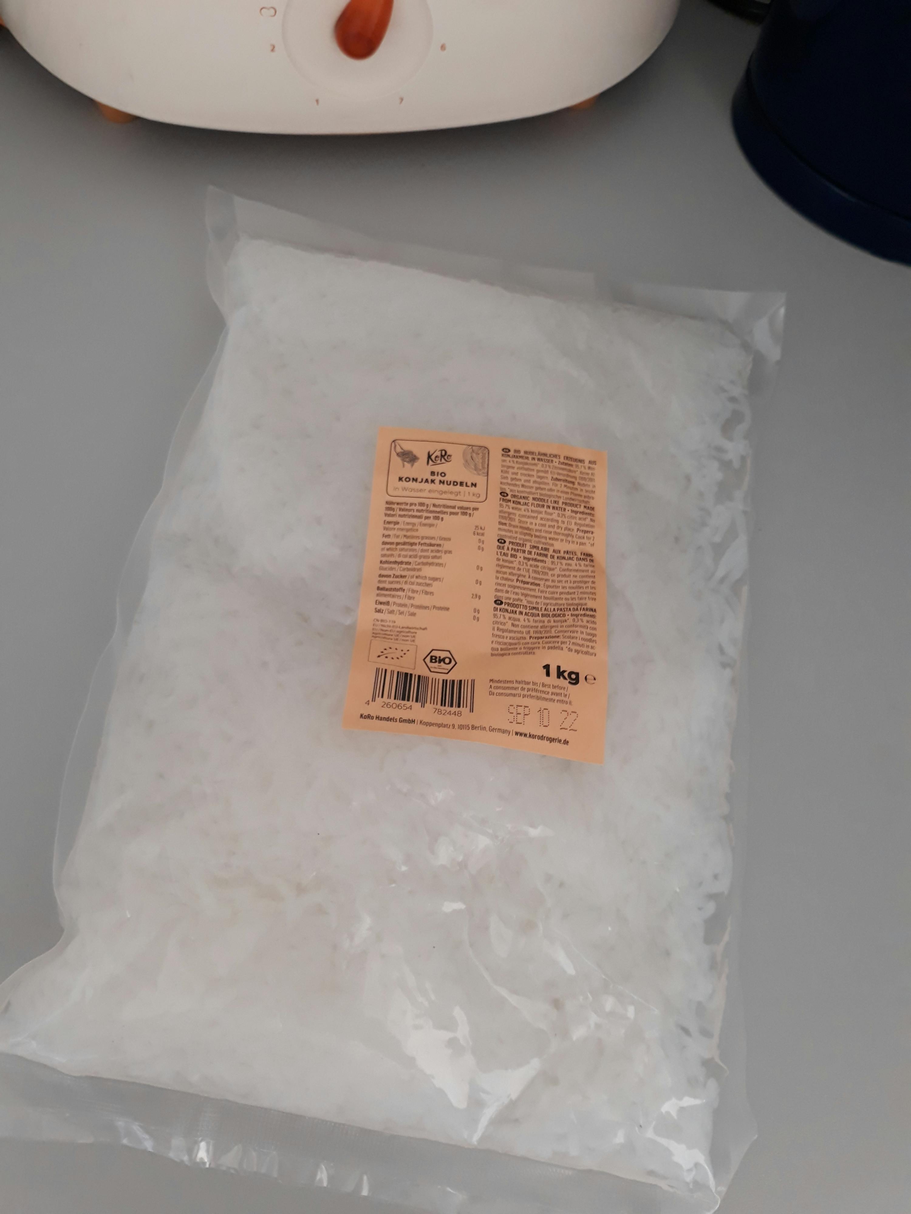 a plastic bag of ice sits on a table