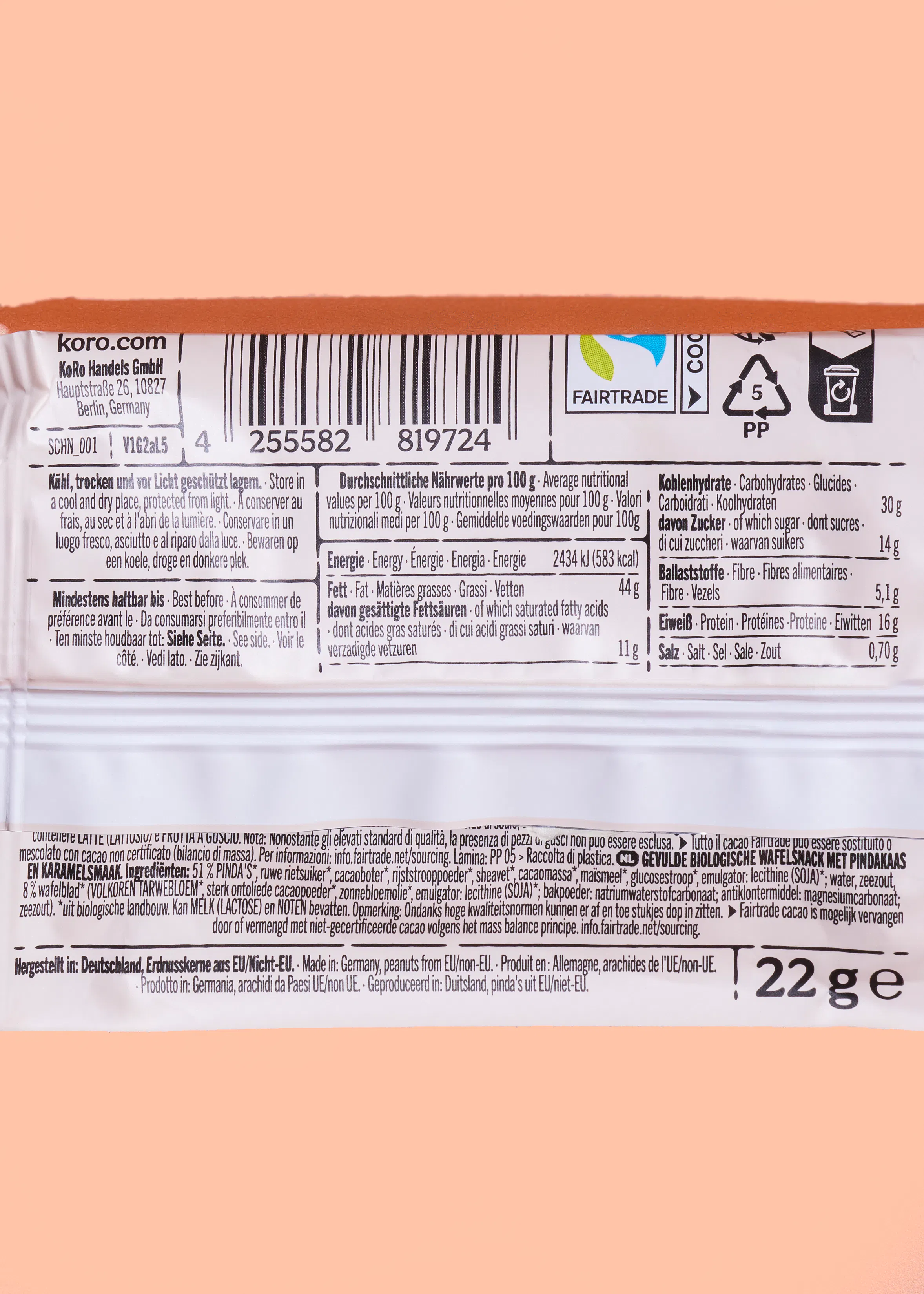 rückseite einer koro-lebensmittelverpackung mit fairtrade-logo, nährwerttabelle, zutatenliste und dem gewicht von 22g.