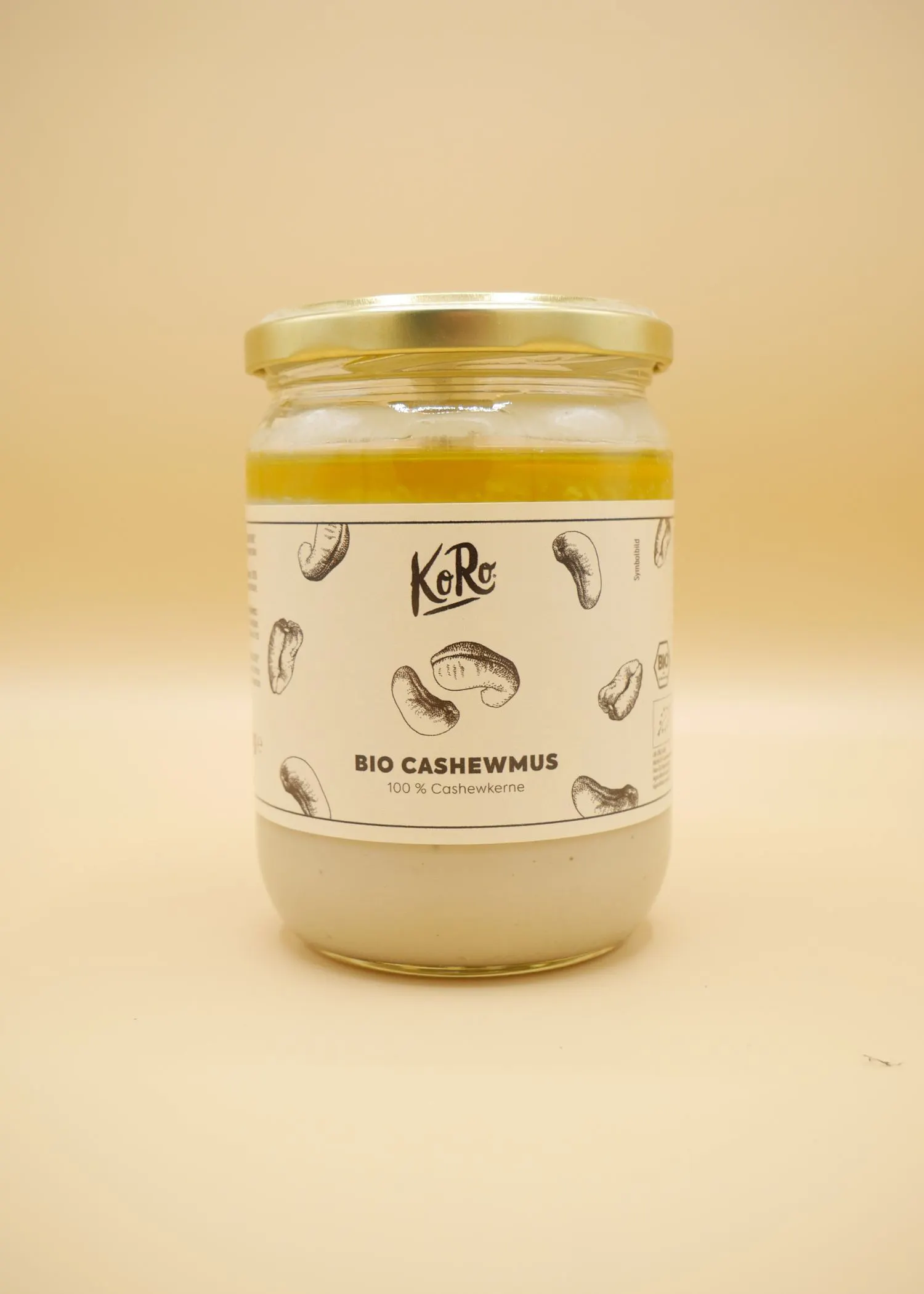 ein Glas bio Cashewmus mit einem weißen Etikett
