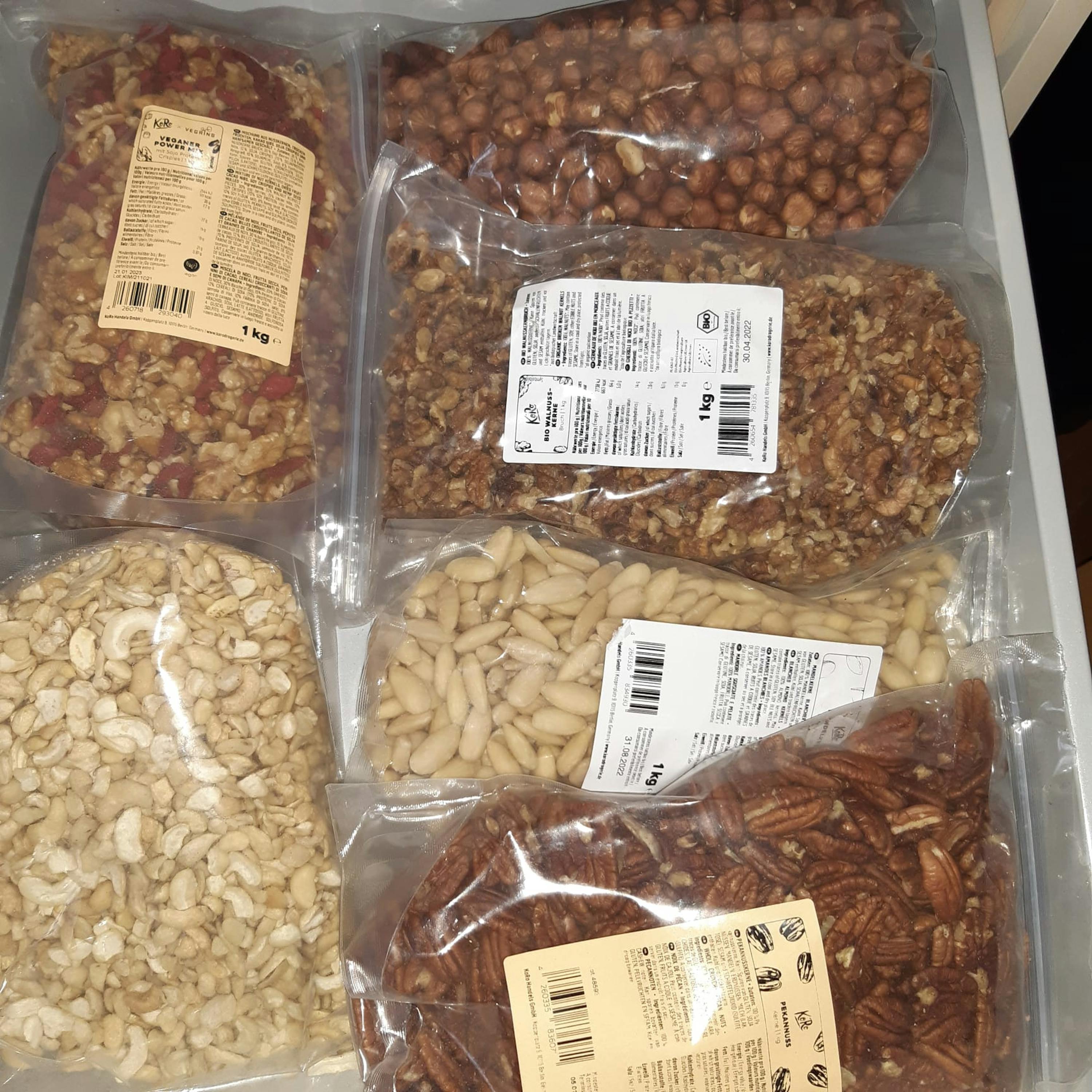 several bags of nuts including hazelnuts and pecans