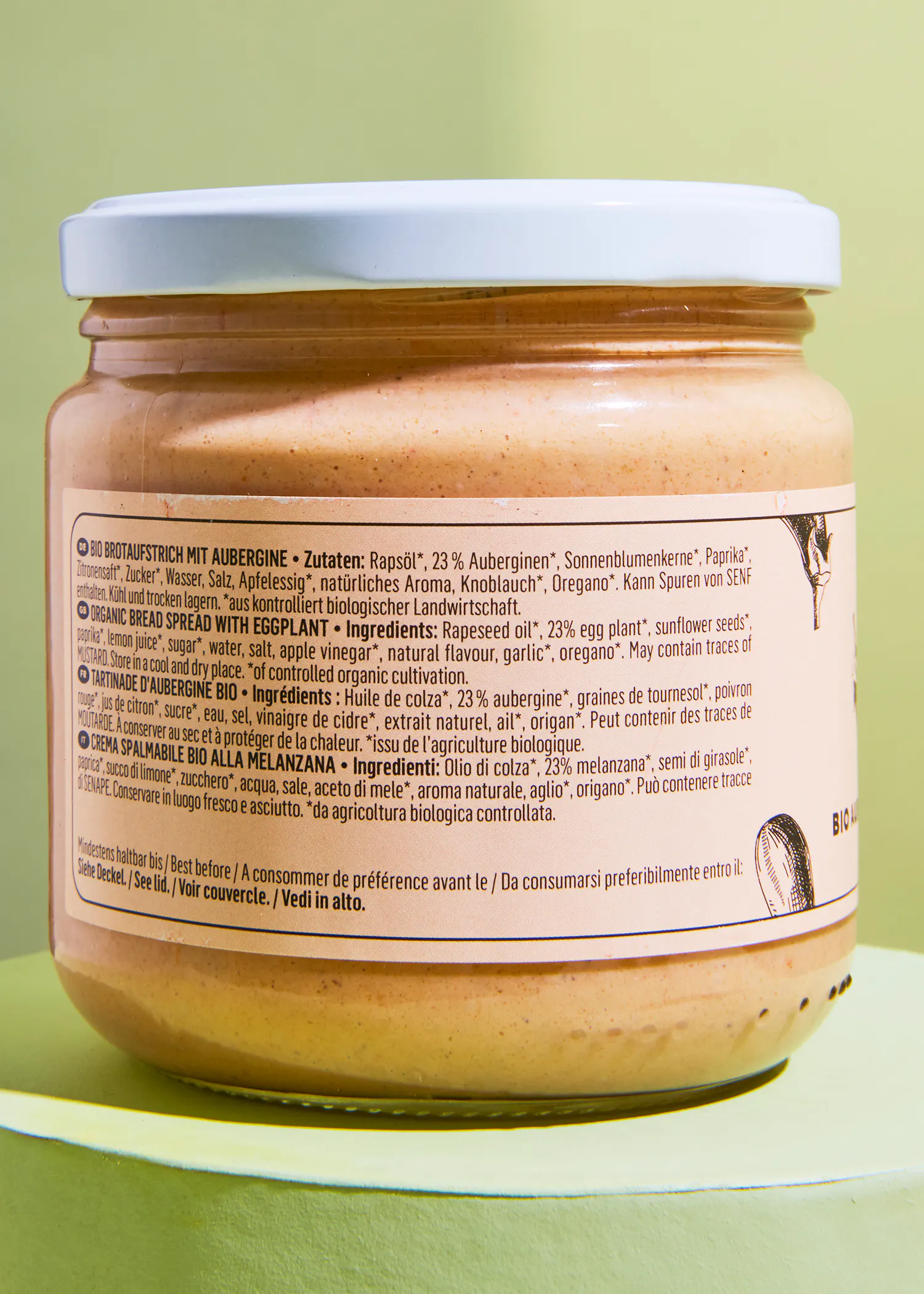 die Rückseite eines Glases Brotaufstrich mit aubergine