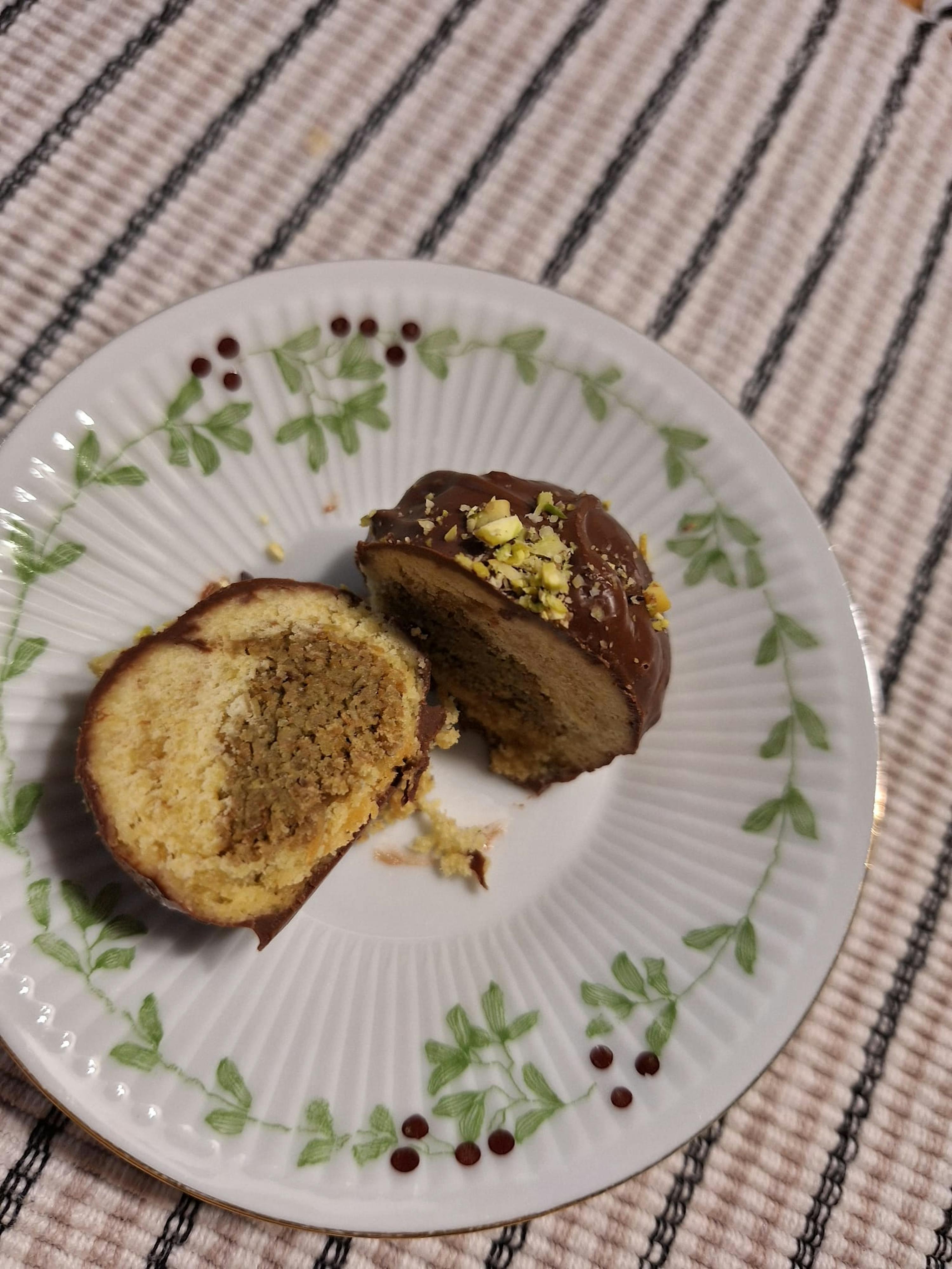 a white plate with a slice of cake on it
