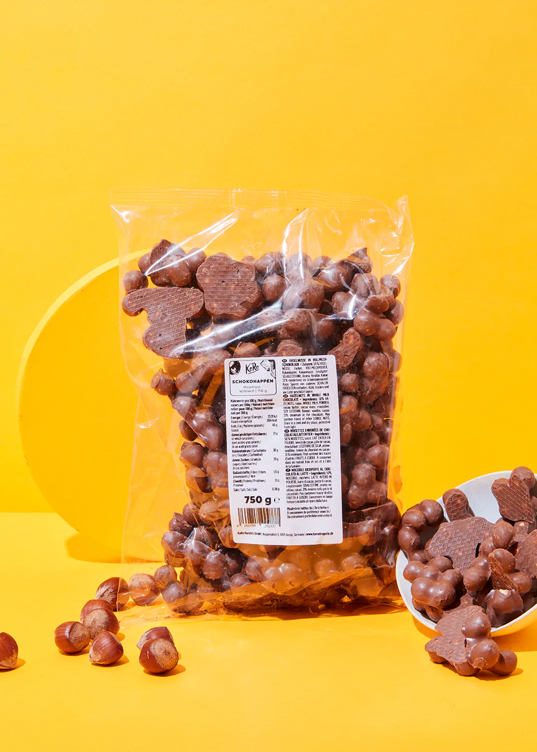a bag of chocolate covered nuts has a label that says 750 g