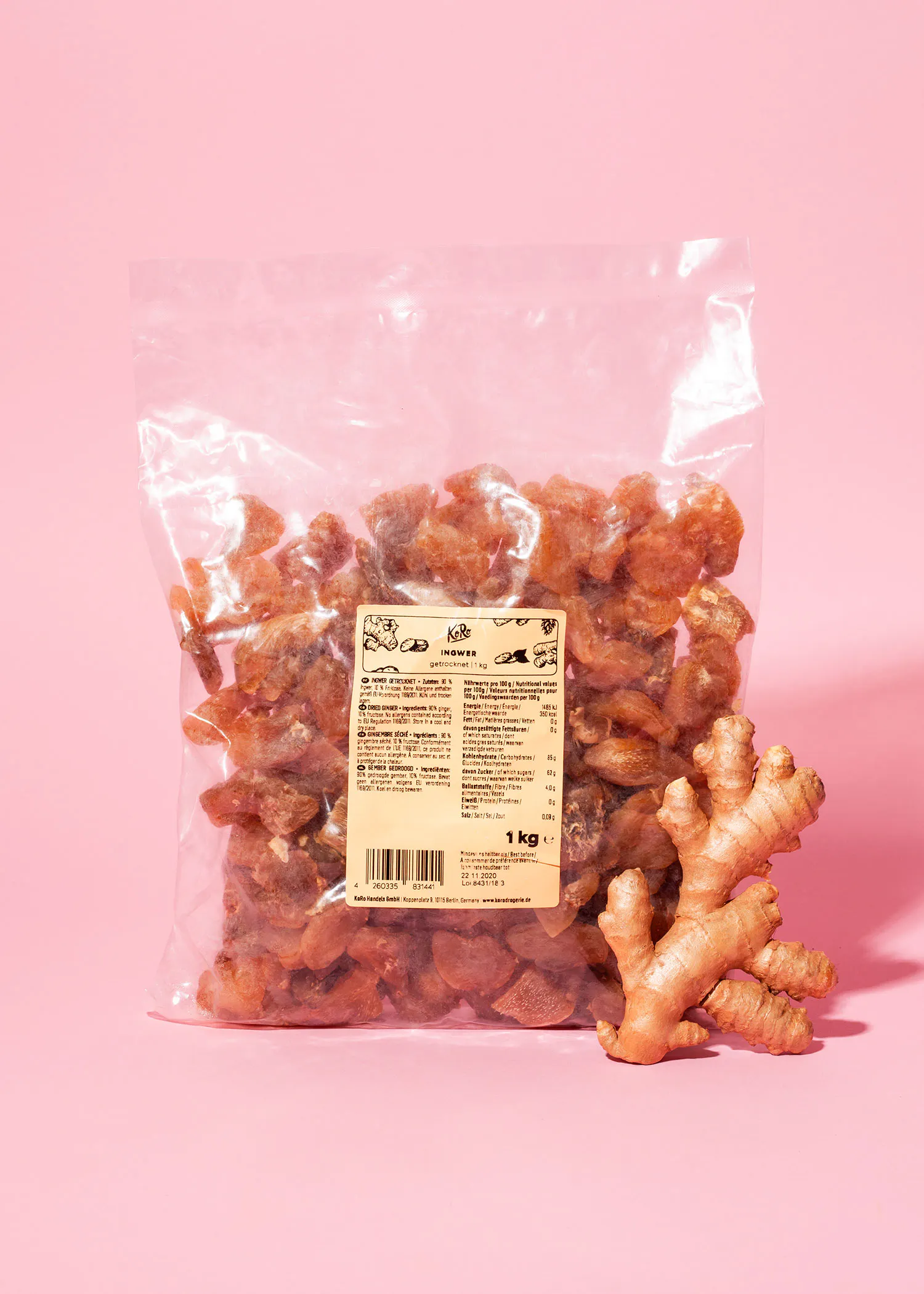 a bag of ginger next to a piece of ginger