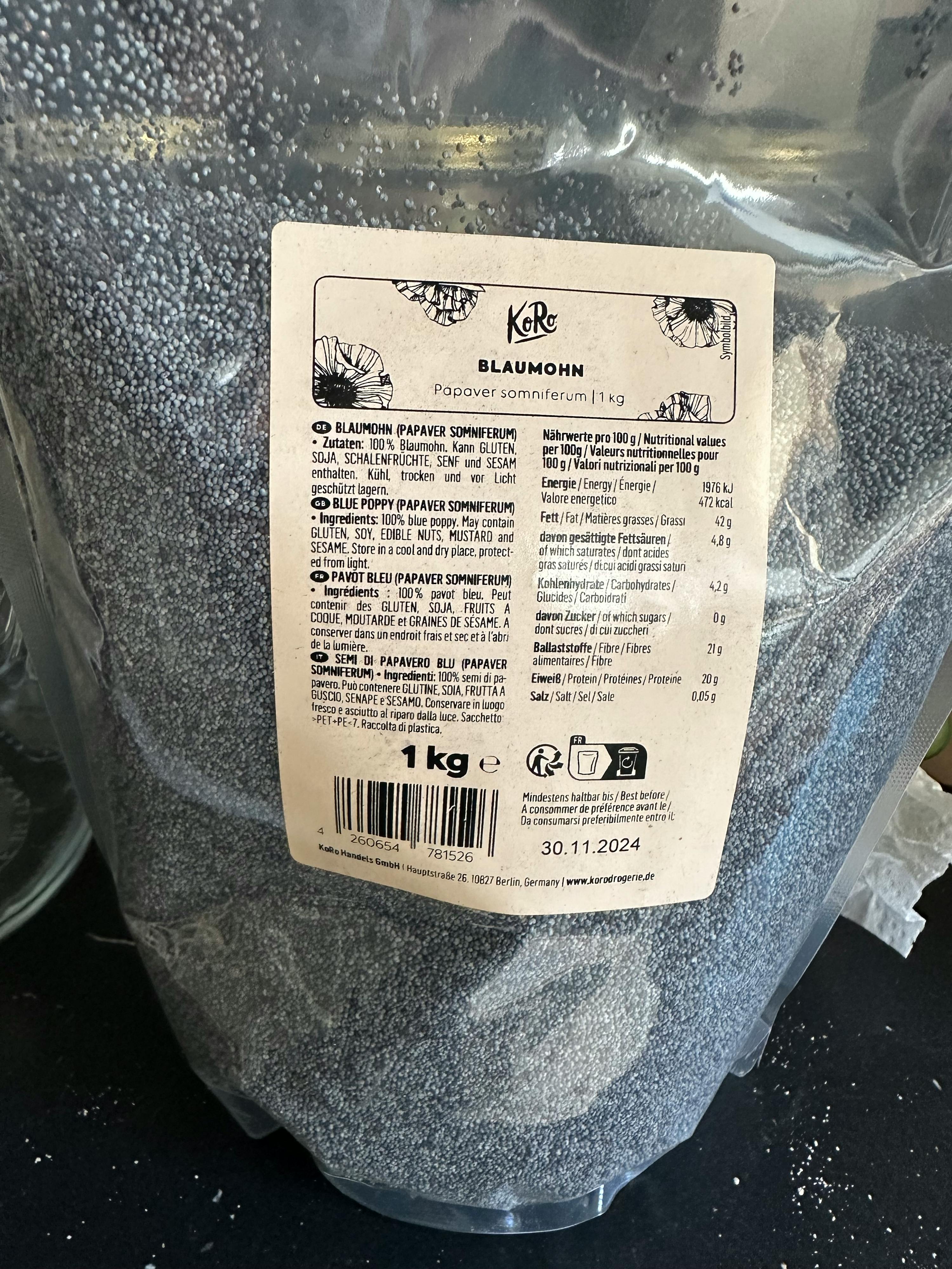 a bag of poppy seeds with a label that says 1 kg
