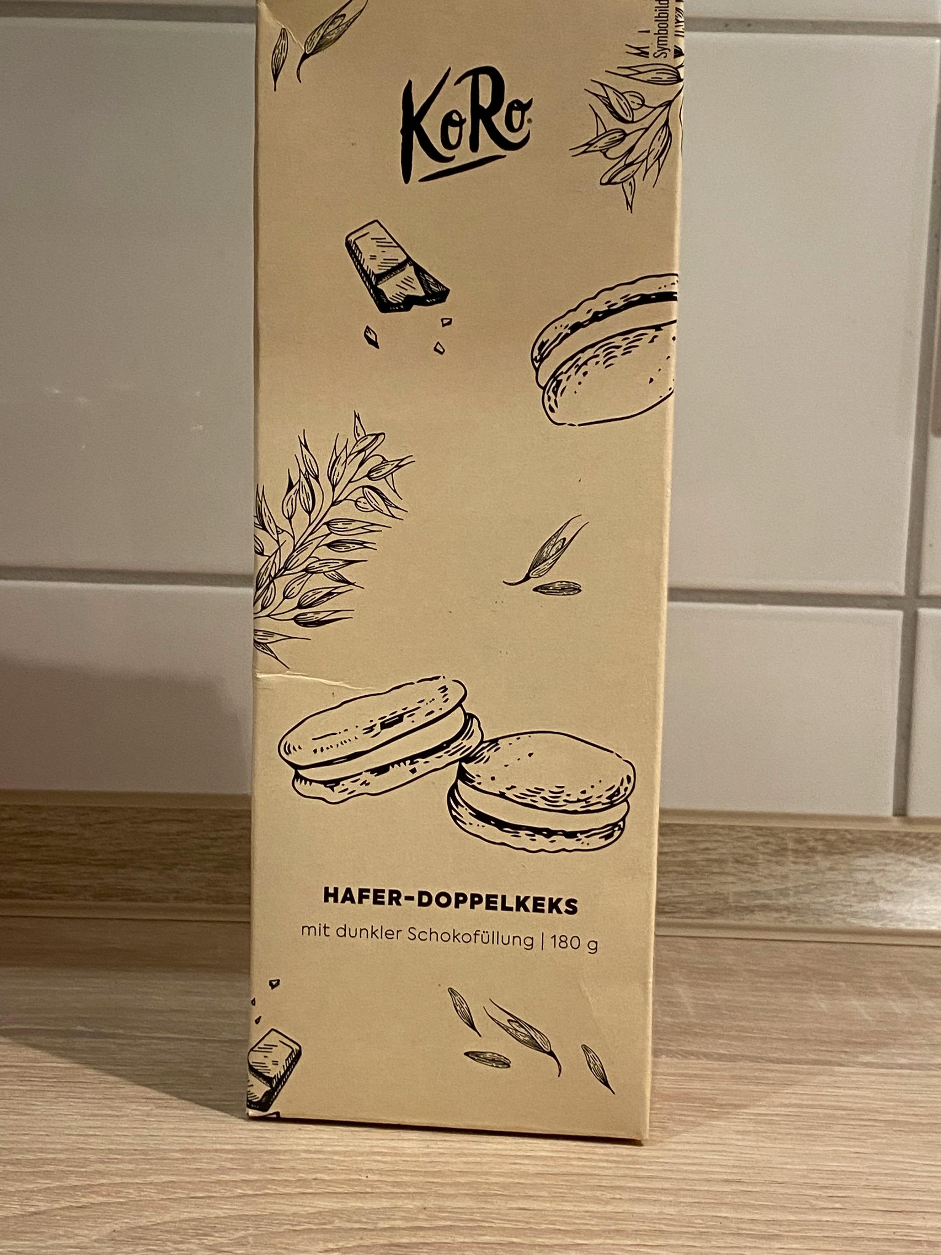 eine Schachtel hafer-doppelkeks mit dunkler schokoladenfüllung