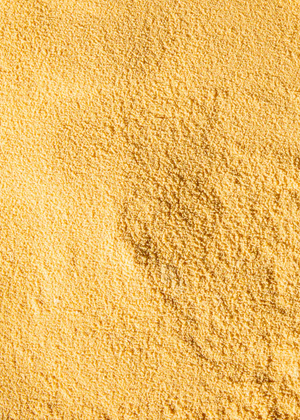 un gros plan d' un tas de grains jaunes