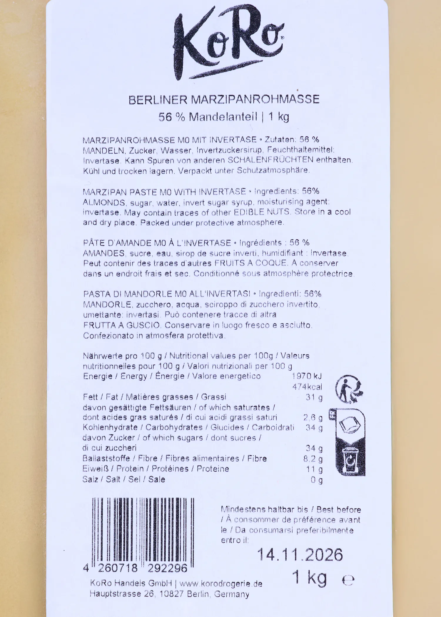 ein produktetikett für koro berliner marzipanrohmasse mit 56% mandelanteil und einem gewicht von 1 kg, mit einem mindesthaltbarkeitsdatum vom 14.11.2026.