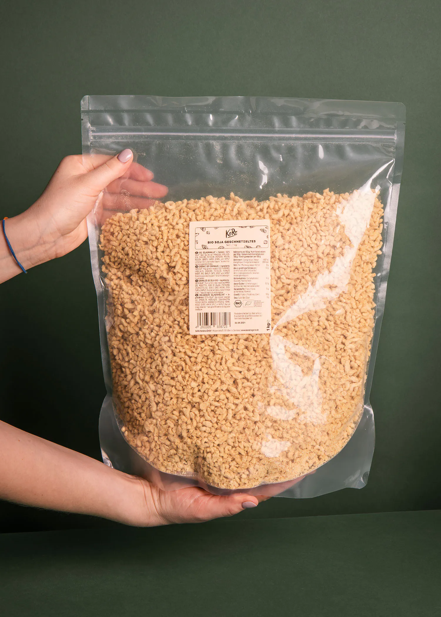 a person is holding a bag of rice with a label that says ' rice ' on it