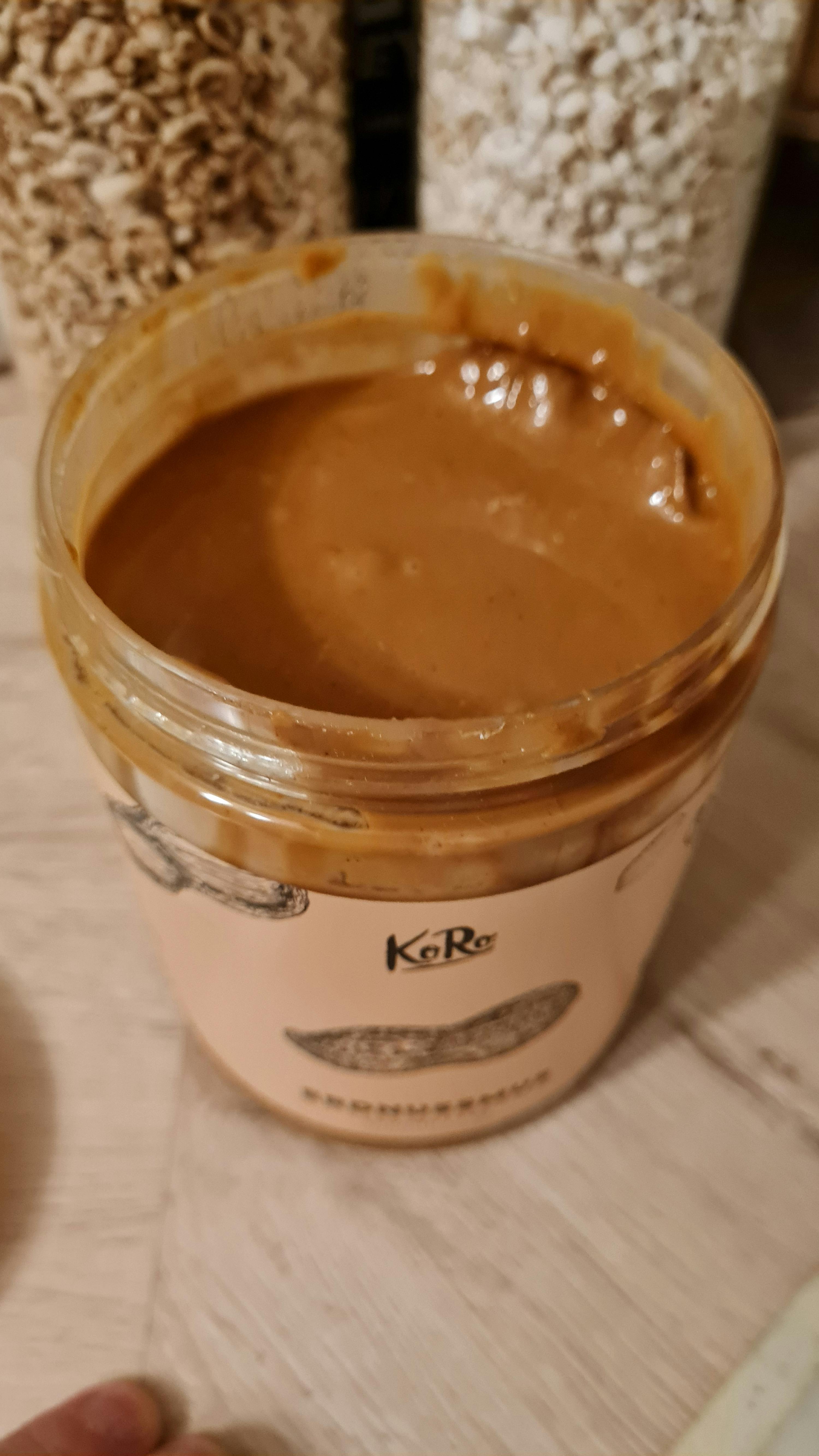 a jar of peanut butter with a label that says k-re