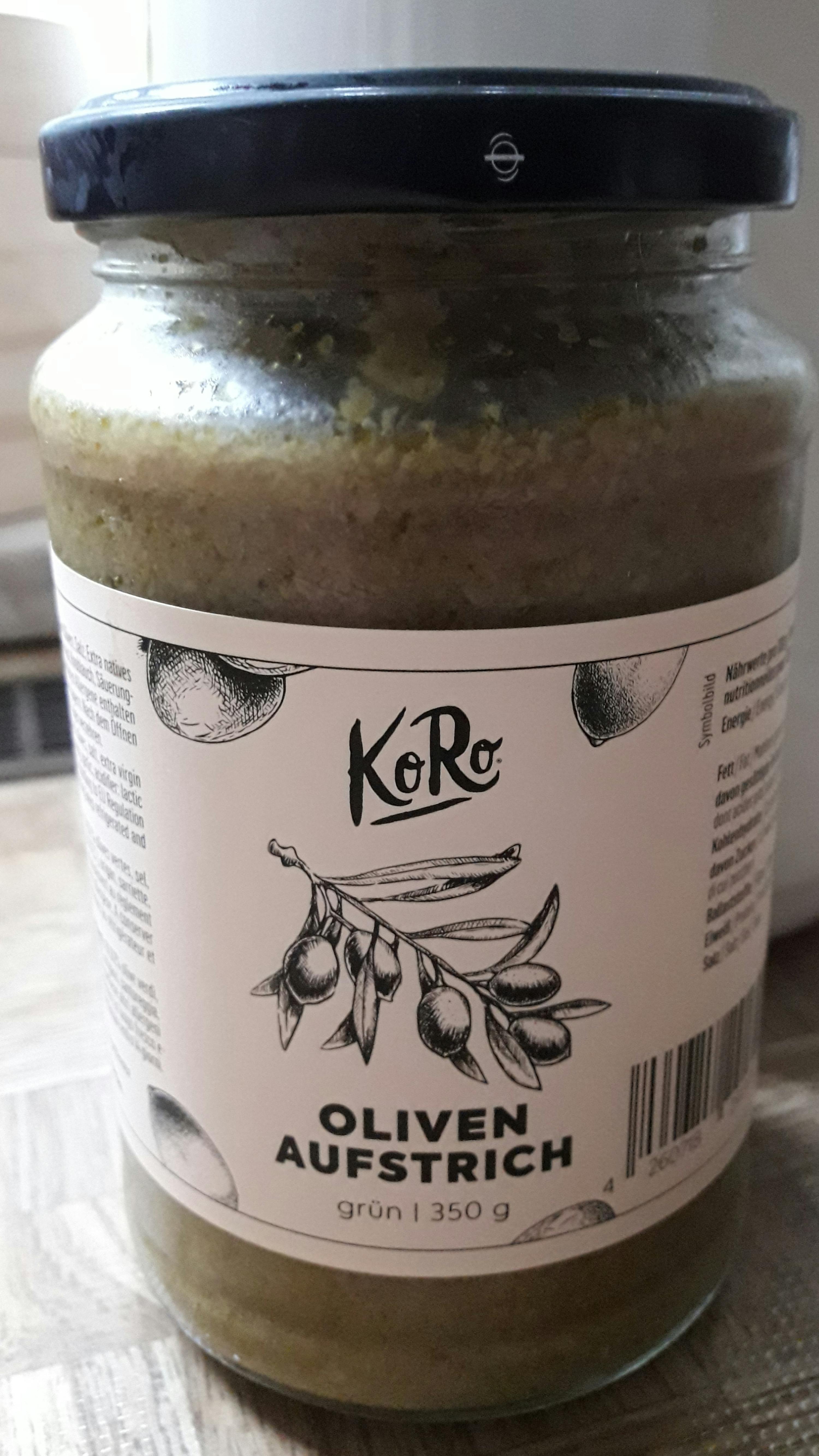 a jar of koro oliven aufstrich green 350 g