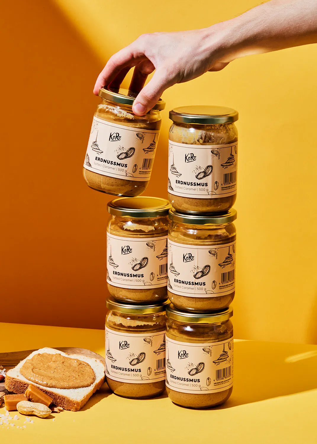 jars of erdnussmus are stacked on top of each other