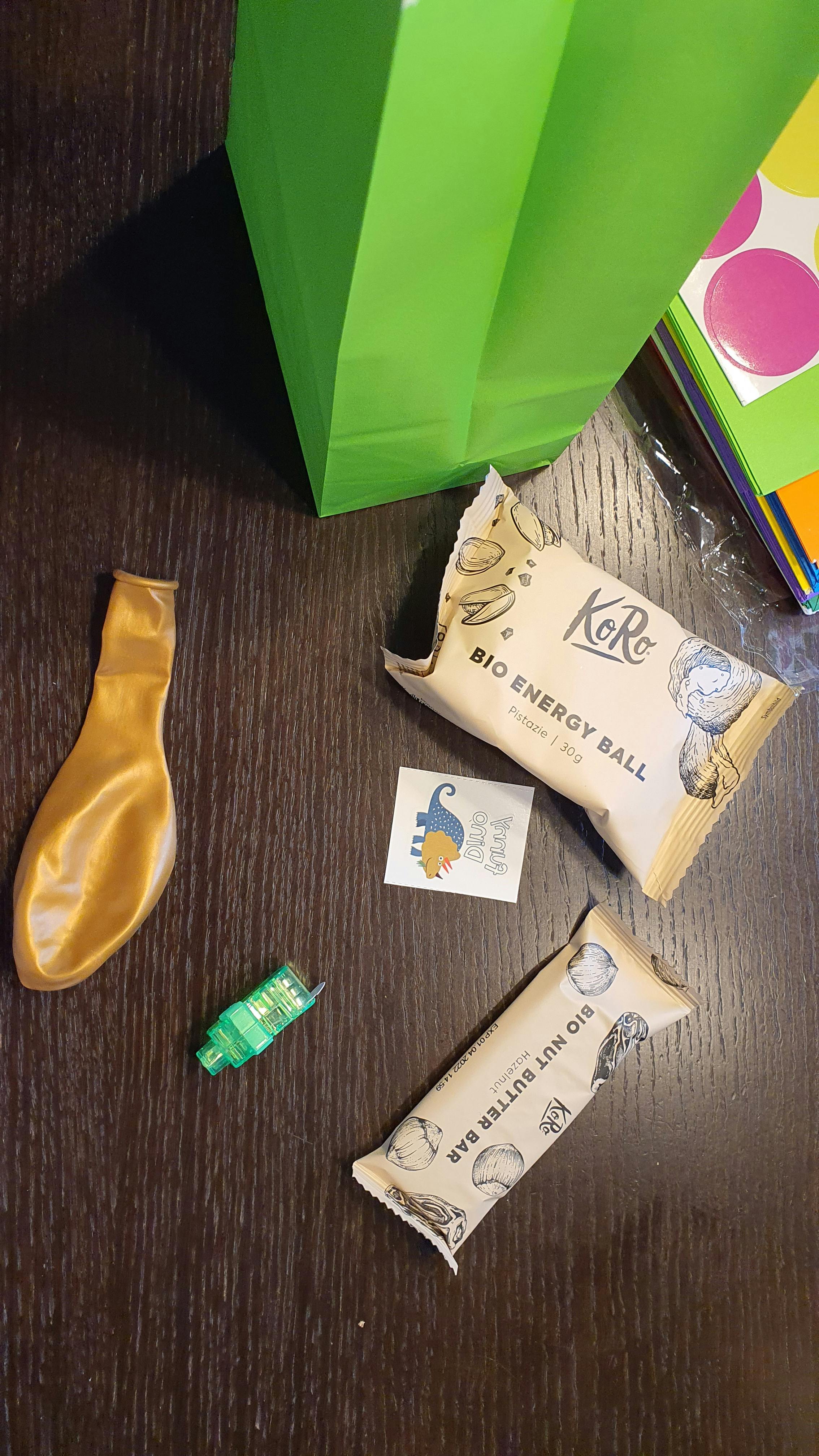 a package of bio energy ball next to a package of bio nut butter bar