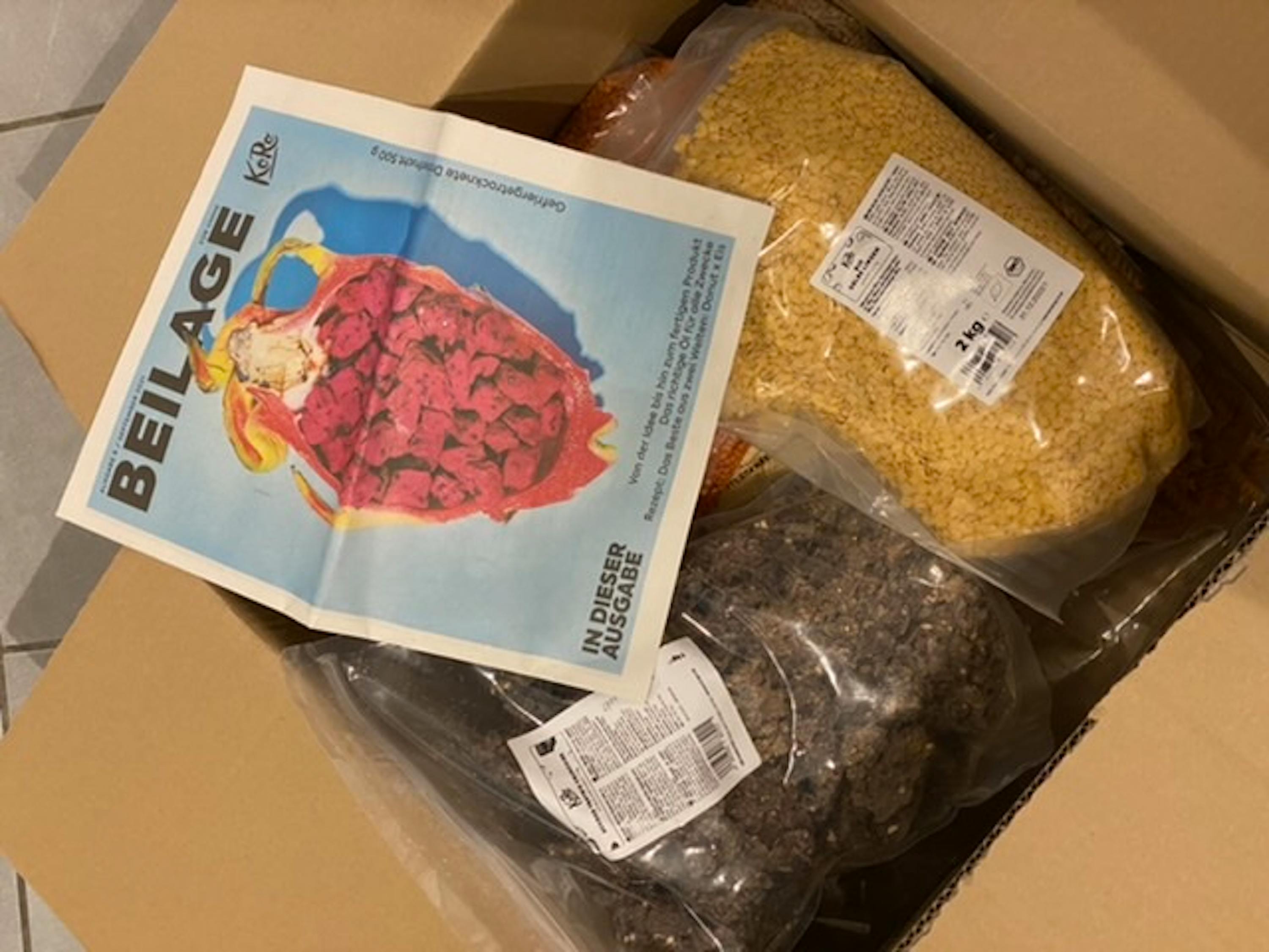 a box filled with food and a magazine titled beilage