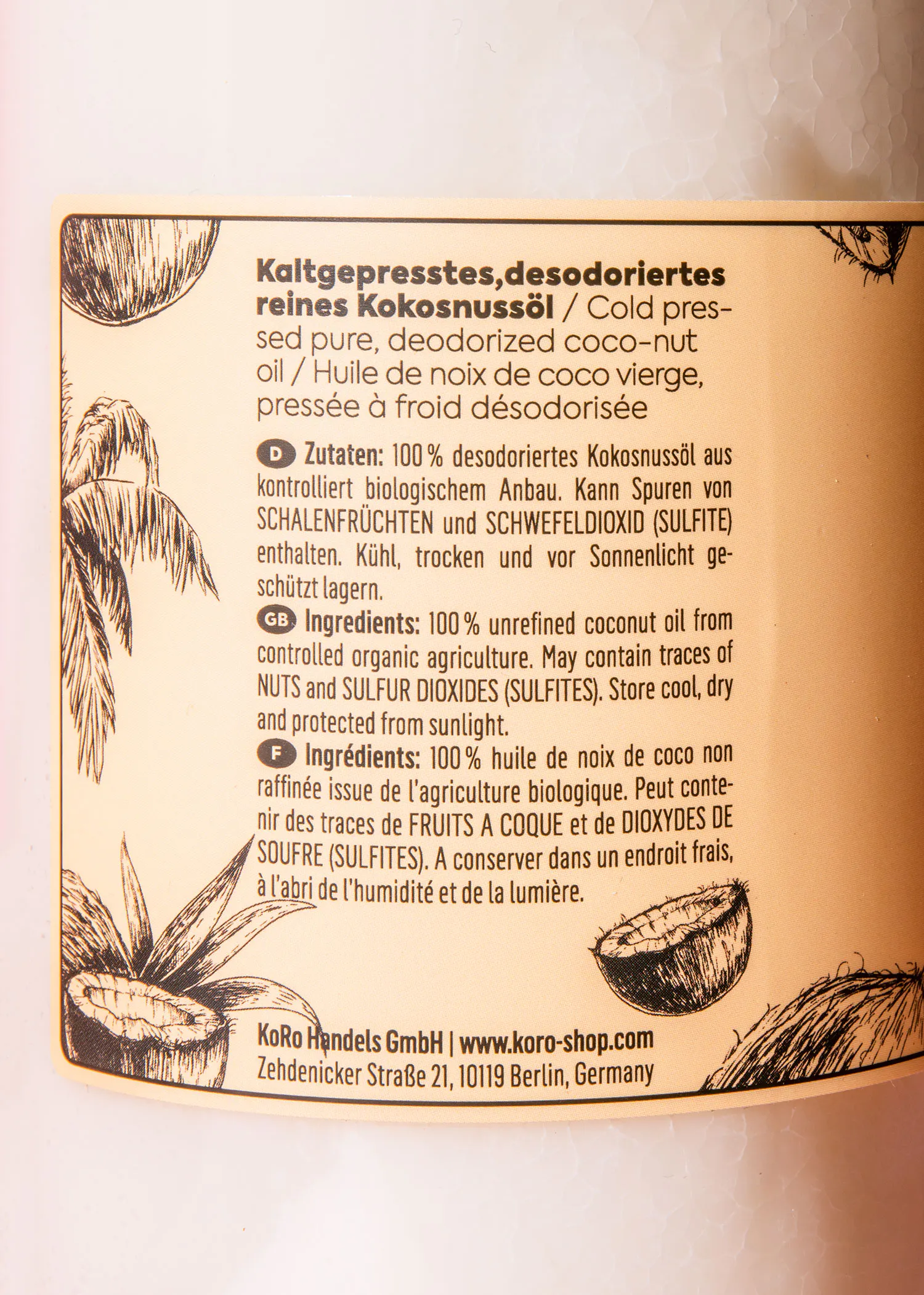 the back of a bottle of coconut oil from koro-handels gmbh
