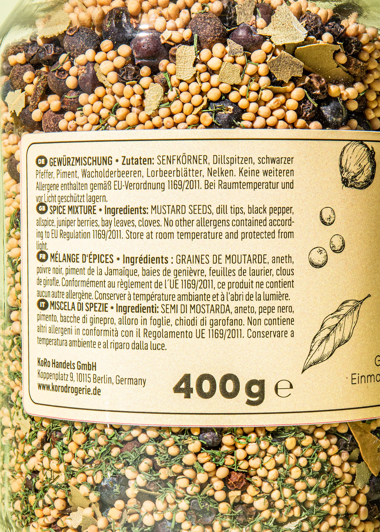 l' arrière d' un bocal en verre contient 400g de graines de moutarde