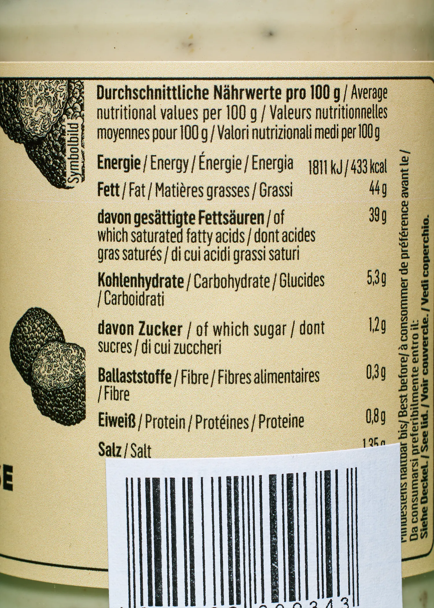 l' étiquette d' une bouteille de sauce montre les valeurs nutritionnelles moyennes pour 100 g
